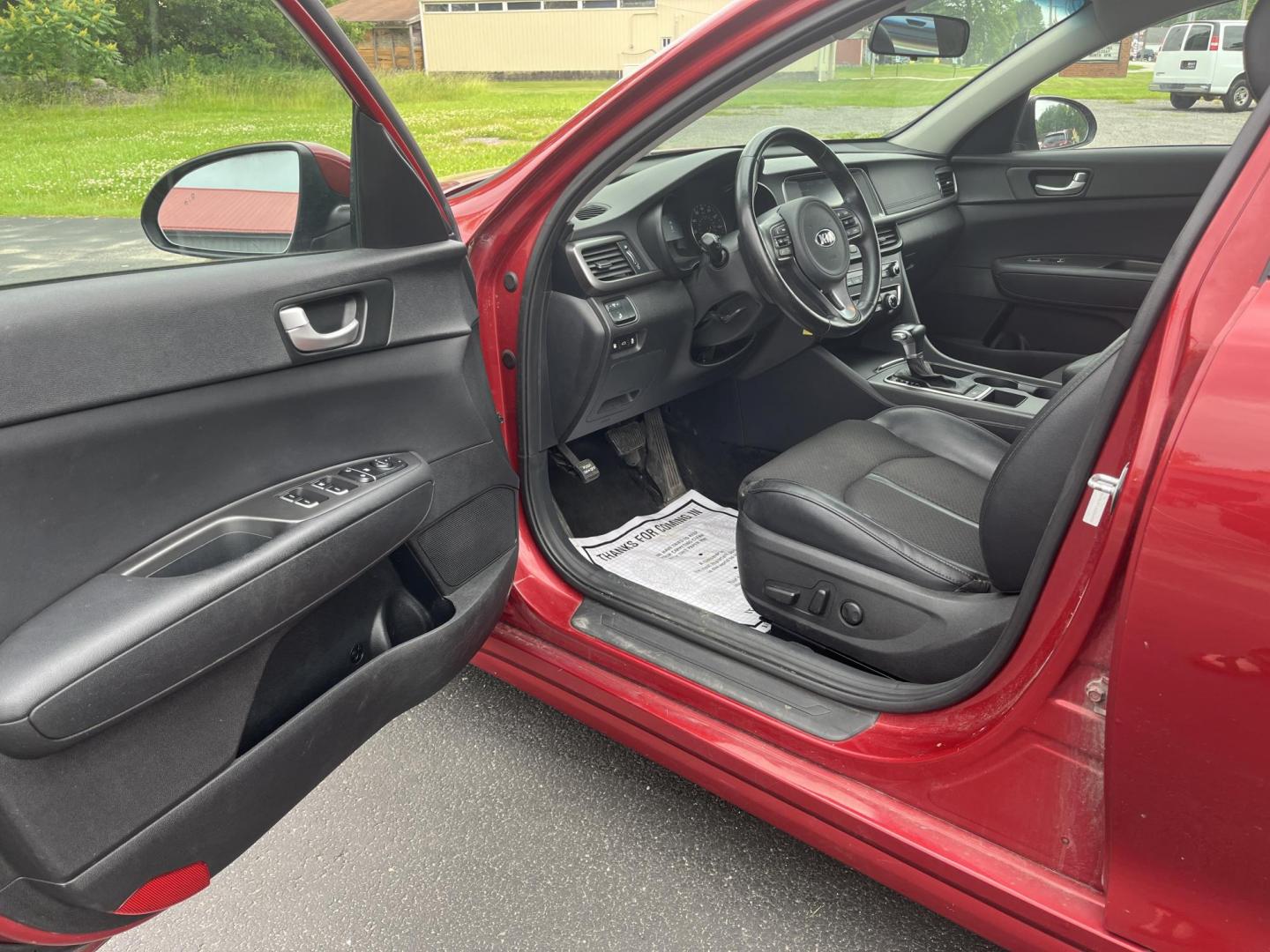 2018 Red /Black Kia Optima S (5XXGT4L37JG) with an 2.4L I4 DOHC 16V engine, 6 Speed Automatic transmission, located at 547 E. Main St., Orwell, OH, 44076, (440) 437-5893, 41.535435, -80.847855 - FRESH TRADE ALERT ---- This 2018 Kia Optima S is fuel efficient sedan with plenty of nice features. Powered by a 2.4 GDI engine and a 6 speed automatic transmission it's fuel efficient will not disappoint achieving a rating of 28 MPG combined and 34 MPG highway. On the exterior you get LED fog light - Photo#7