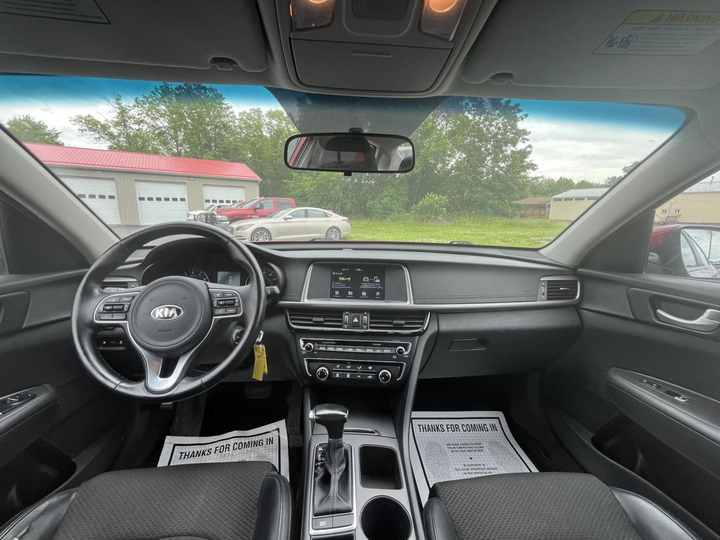 2018 Red /Black Kia Optima S (5XXGT4L37JG) with an 2.4L I4 DOHC 16V engine, 6 Speed Automatic transmission, located at 547 E. Main St., Orwell, OH, 44076, (440) 437-5893, 41.535435, -80.847855 - FRESH TRADE ALERT ---- This 2018 Kia Optima S is fuel efficient sedan with plenty of nice features. Powered by a 2.4 GDI engine and a 6 speed automatic transmission it's fuel efficient will not disappoint achieving a rating of 28 MPG combined and 34 MPG highway. On the exterior you get LED fog light - Photo#21