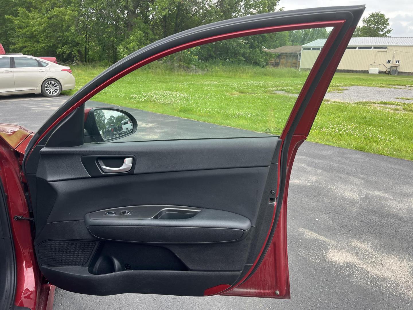 2018 Red /Black Kia Optima S (5XXGT4L37JG) with an 2.4L I4 DOHC 16V engine, 6 Speed Automatic transmission, located at 547 E. Main St., Orwell, OH, 44076, (440) 437-5893, 41.535435, -80.847855 - FRESH TRADE ALERT ---- This 2018 Kia Optima S is fuel efficient sedan with plenty of nice features. Powered by a 2.4 GDI engine and a 6 speed automatic transmission it's fuel efficient will not disappoint achieving a rating of 28 MPG combined and 34 MPG highway. On the exterior you get LED fog light - Photo#25