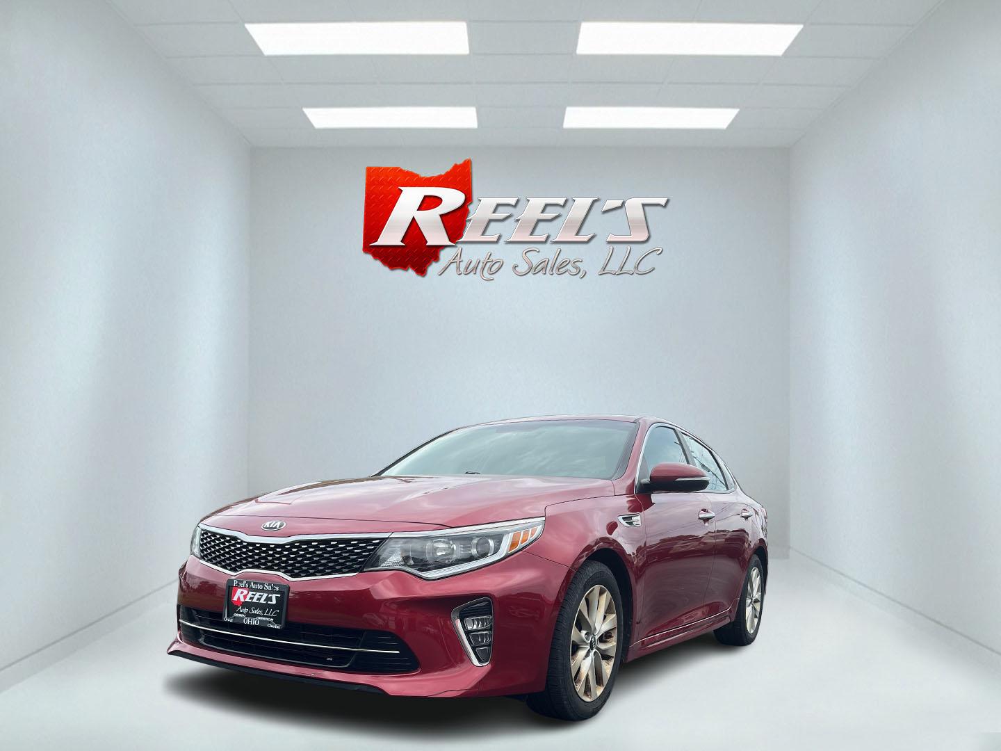 2018 Red /Black Kia Optima S (5XXGT4L37JG) with an 2.4L I4 DOHC 16V engine, 6 Speed Automatic transmission, located at 547 E. Main St., Orwell, OH, 44076, (440) 437-5893, 41.535435, -80.847855 - FRESH TRADE ALERT ---- This 2018 Kia Optima S is fuel efficient sedan with plenty of nice features. Powered by a 2.4 GDI engine and a 6 speed automatic transmission it's fuel efficient will not disappoint achieving a rating of 28 MPG combined and 34 MPG highway. On the exterior you get LED fog light - Photo#0