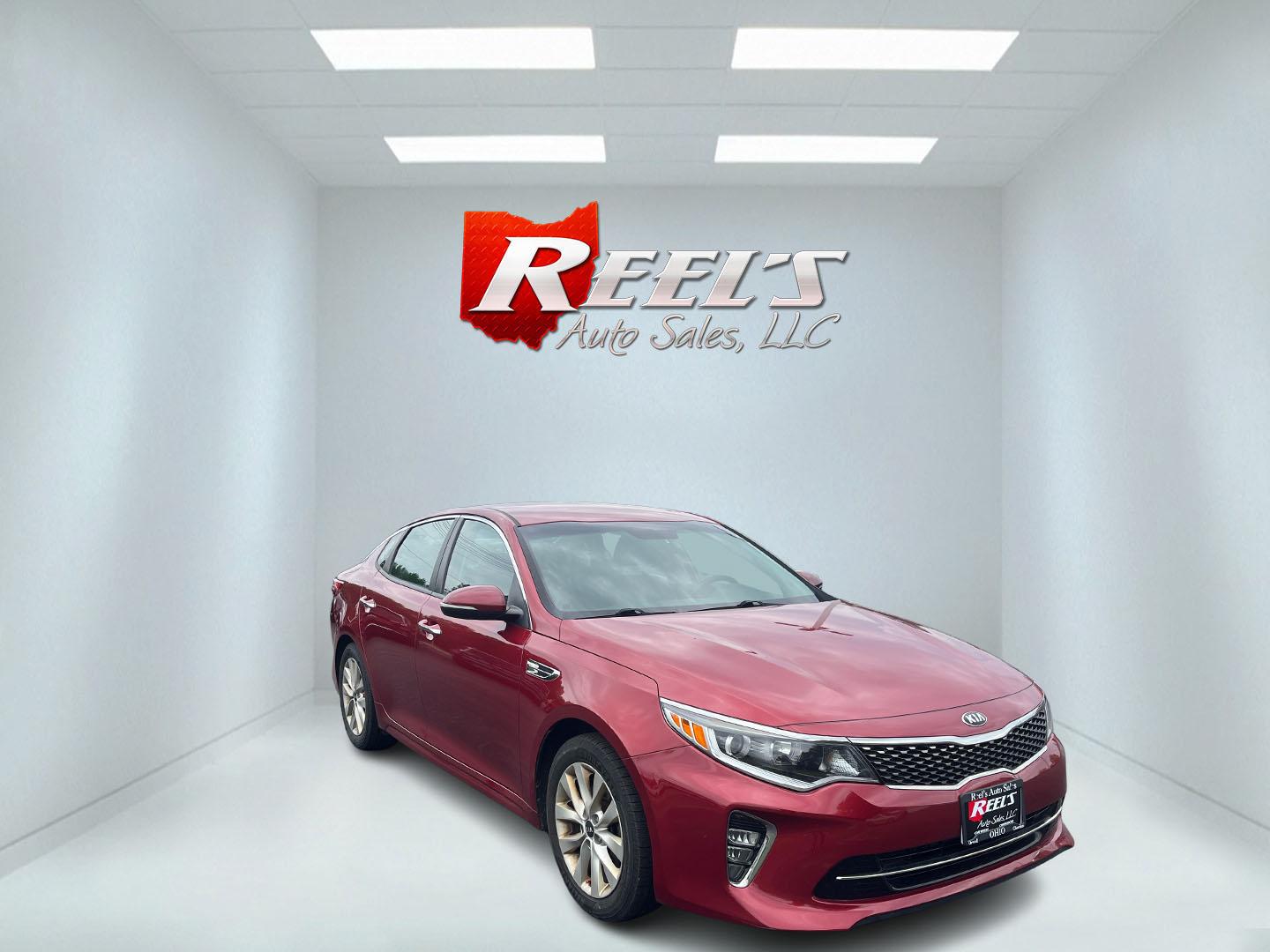 2018 Red /Black Kia Optima S (5XXGT4L37JG) with an 2.4L I4 DOHC 16V engine, 6 Speed Automatic transmission, located at 547 E. Main St., Orwell, OH, 44076, (440) 437-5893, 41.535435, -80.847855 - FRESH TRADE ALERT ---- This 2018 Kia Optima S is fuel efficient sedan with plenty of nice features. Powered by a 2.4 GDI engine and a 6 speed automatic transmission it's fuel efficient will not disappoint achieving a rating of 28 MPG combined and 34 MPG highway. On the exterior you get LED fog light - Photo#2