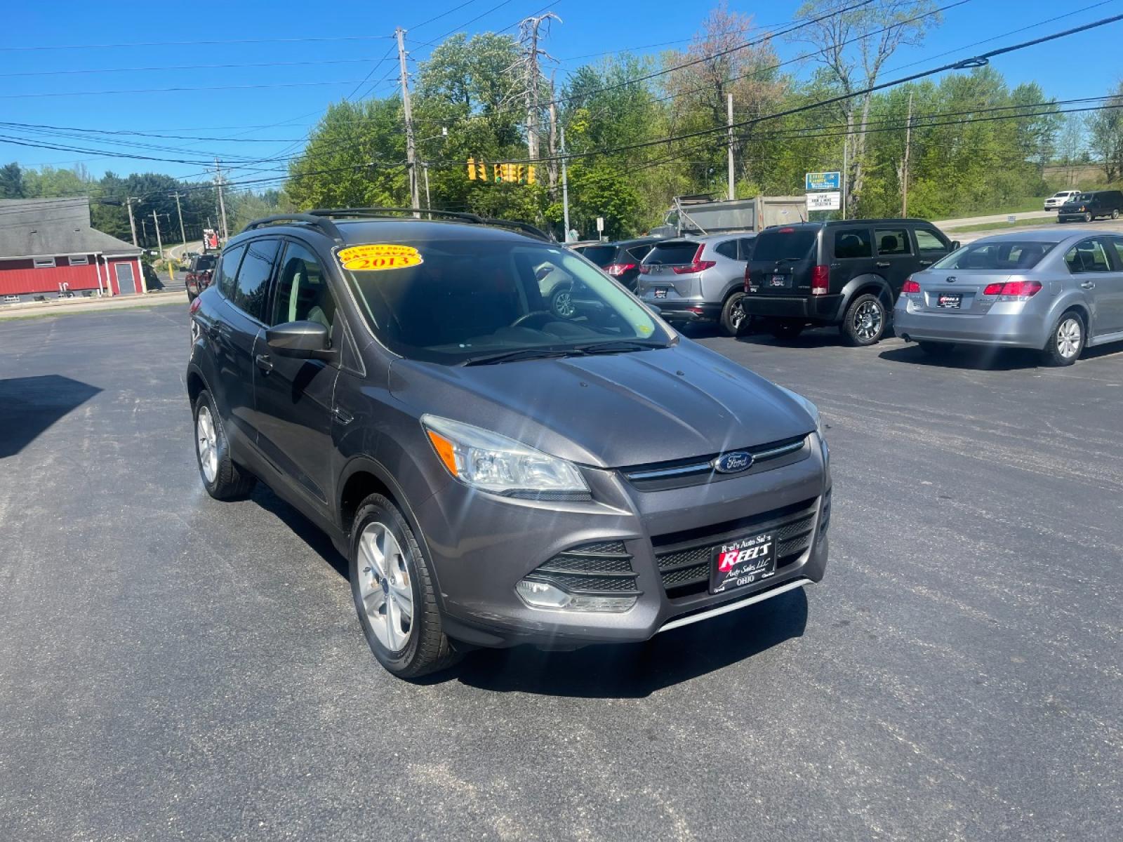 2013 Ingot Silver Metallic /Black and Gray Ford Escape SE AWD (1FMCU9GX1DU) with an 1.6L L4 DOHC 16V engine, 6-Speed Automatic transmission, located at 11115 Chardon Rd. , Chardon, OH, 44024, (440) 214-9705, 41.580246, -81.241943 - Photo #5