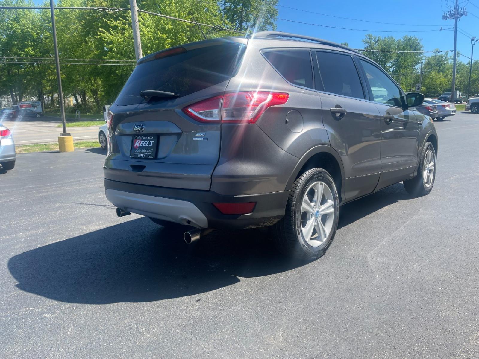 2013 Ingot Silver Metallic /Black and Gray Ford Escape SE AWD (1FMCU9GX1DU) with an 1.6L L4 DOHC 16V engine, 6-Speed Automatic transmission, located at 11115 Chardon Rd. , Chardon, OH, 44024, (440) 214-9705, 41.580246, -81.241943 - Photo #7