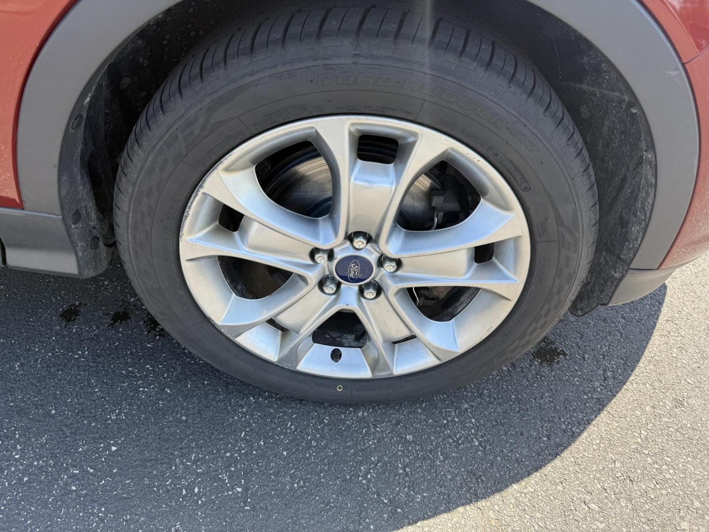 2014 Sunset Metallic /Tan Ford Escape Titanium 4WD (1FMCU9JX7EU) with an 1.6L I4 DOHC 16V TURBO engine, 6-Speed Automatic transmission, located at 547 E. Main St., Orwell, OH, 44076, (440) 437-5893, 41.535435, -80.847855 - This 2014 Ford Escape is a well equipped compact SUV. With a 1.6L EcoBoost turbocharged I4 engine paired with a 6-speed automatic transmission, delivering an impressive 30 MPG on the highway. It offers a luxurious interior with leather seats, heated front seats, and dual-zone automatic climate contr - Photo#5