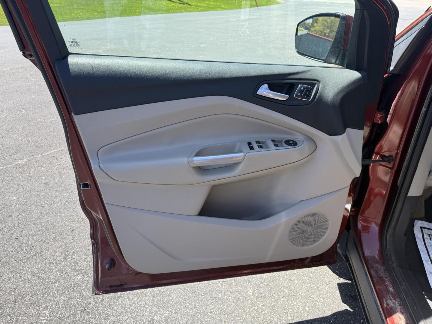 2014 Sunset Metallic /Tan Ford Escape Titanium 4WD (1FMCU9JX7EU) with an 1.6L I4 DOHC 16V TURBO engine, 6-Speed Automatic transmission, located at 547 E. Main St., Orwell, OH, 44076, (440) 437-5893, 41.535435, -80.847855 - This 2014 Ford Escape is a well equipped compact SUV. With a 1.6L EcoBoost turbocharged I4 engine paired with a 6-speed automatic transmission, delivering an impressive 30 MPG on the highway. It offers a luxurious interior with leather seats, heated front seats, and dual-zone automatic climate contr - Photo#4