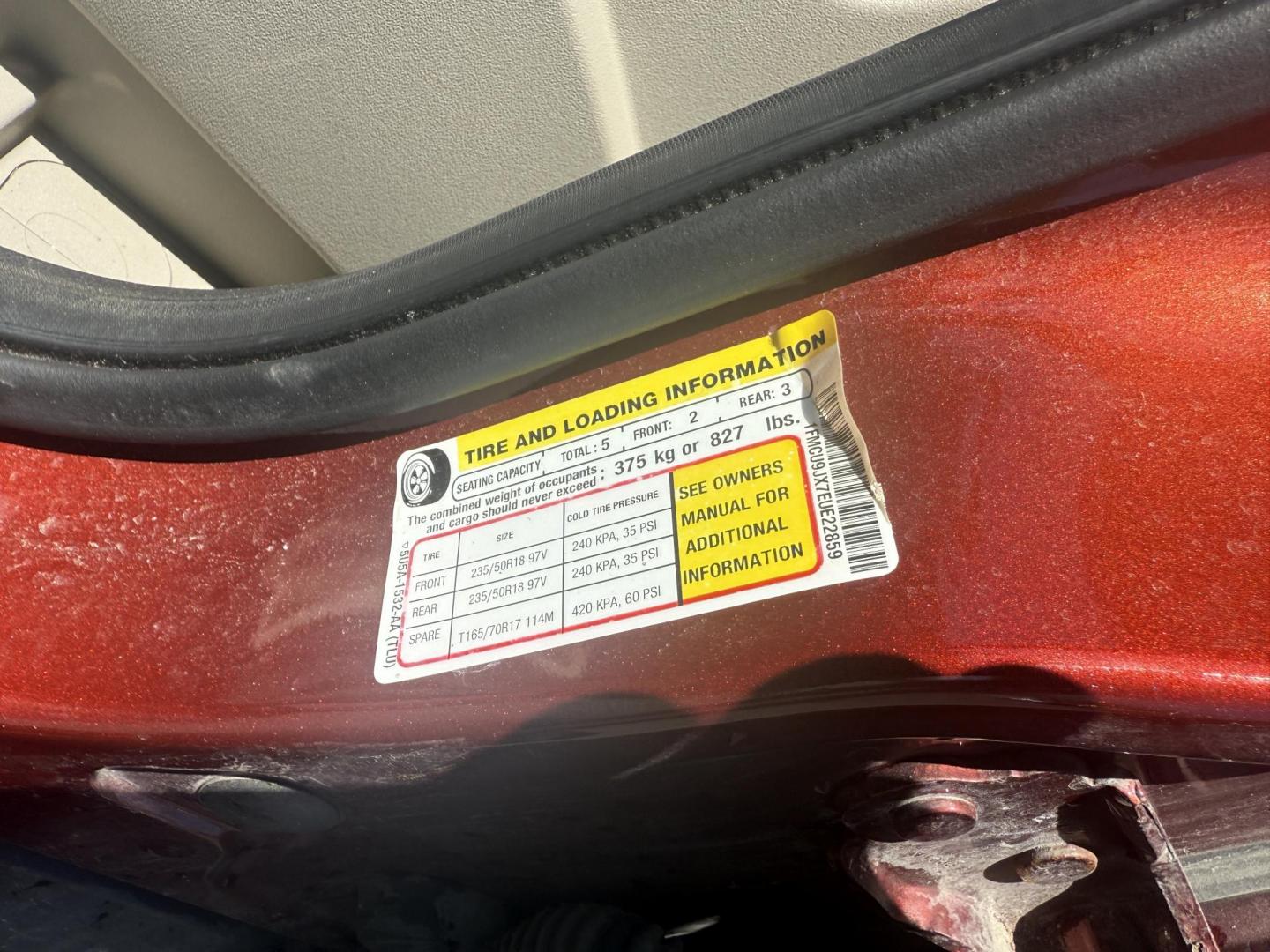 2014 Sunset Metallic /Tan Ford Escape Titanium 4WD (1FMCU9JX7EU) with an 1.6L I4 DOHC 16V TURBO engine, 6-Speed Automatic transmission, located at 547 E. Main St., Orwell, OH, 44076, (440) 437-5893, 41.535435, -80.847855 - This 2014 Ford Escape is a well equipped compact SUV. With a 1.6L EcoBoost turbocharged I4 engine paired with a 6-speed automatic transmission, delivering an impressive 30 MPG on the highway. It offers a luxurious interior with leather seats, heated front seats, and dual-zone automatic climate contr - Photo#9