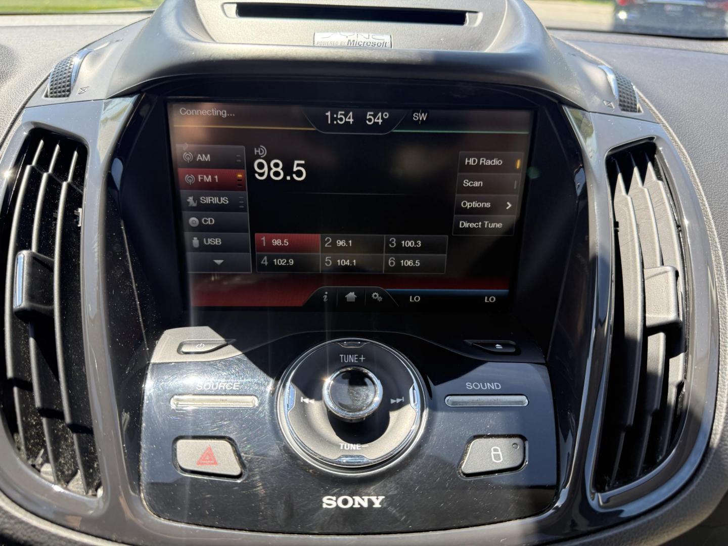 2014 Sunset Metallic /Tan Ford Escape Titanium 4WD (1FMCU9JX7EU) with an 1.6L I4 DOHC 16V TURBO engine, 6-Speed Automatic transmission, located at 547 E. Main St., Orwell, OH, 44076, (440) 437-5893, 41.535435, -80.847855 - This 2014 Ford Escape is a well equipped compact SUV. With a 1.6L EcoBoost turbocharged I4 engine paired with a 6-speed automatic transmission, delivering an impressive 30 MPG on the highway. It offers a luxurious interior with leather seats, heated front seats, and dual-zone automatic climate contr - Photo#20