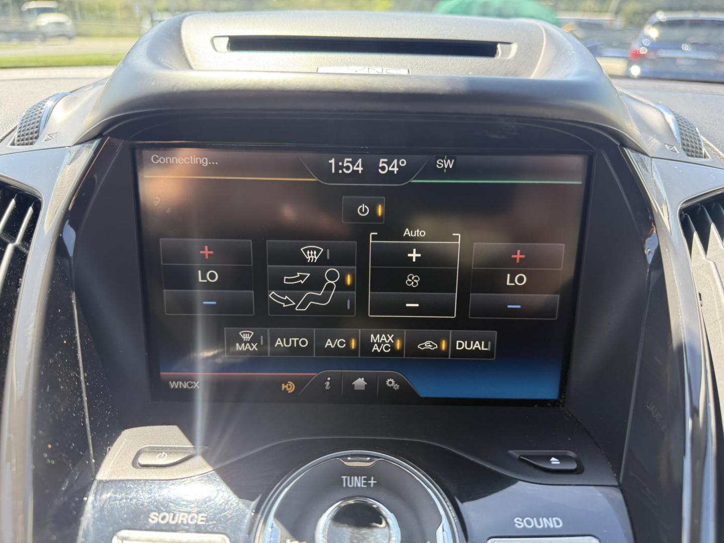 2014 Sunset Metallic /Tan Ford Escape Titanium 4WD (1FMCU9JX7EU) with an 1.6L I4 DOHC 16V TURBO engine, 6-Speed Automatic transmission, located at 547 E. Main St., Orwell, OH, 44076, (440) 437-5893, 41.535435, -80.847855 - This 2014 Ford Escape is a well equipped compact SUV. With a 1.6L EcoBoost turbocharged I4 engine paired with a 6-speed automatic transmission, delivering an impressive 30 MPG on the highway. It offers a luxurious interior with leather seats, heated front seats, and dual-zone automatic climate contr - Photo#22