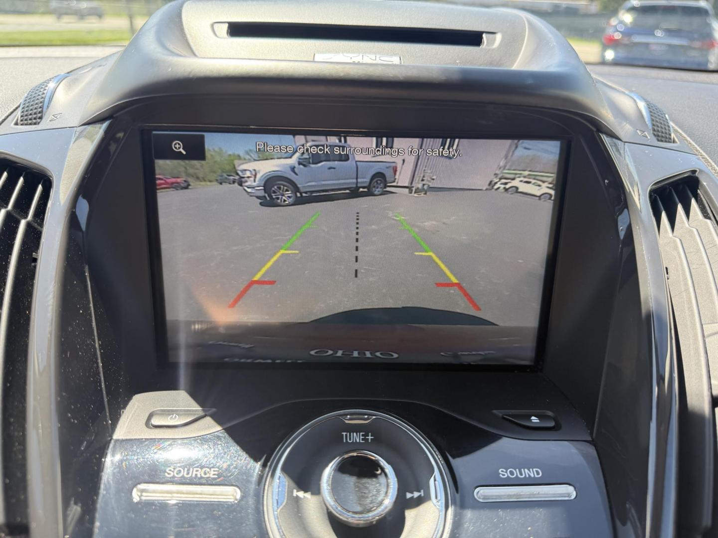 2014 Sunset Metallic /Tan Ford Escape Titanium 4WD (1FMCU9JX7EU) with an 1.6L I4 DOHC 16V TURBO engine, 6-Speed Automatic transmission, located at 547 E. Main St., Orwell, OH, 44076, (440) 437-5893, 41.535435, -80.847855 - This 2014 Ford Escape is a well equipped compact SUV. With a 1.6L EcoBoost turbocharged I4 engine paired with a 6-speed automatic transmission, delivering an impressive 30 MPG on the highway. It offers a luxurious interior with leather seats, heated front seats, and dual-zone automatic climate contr - Photo#23