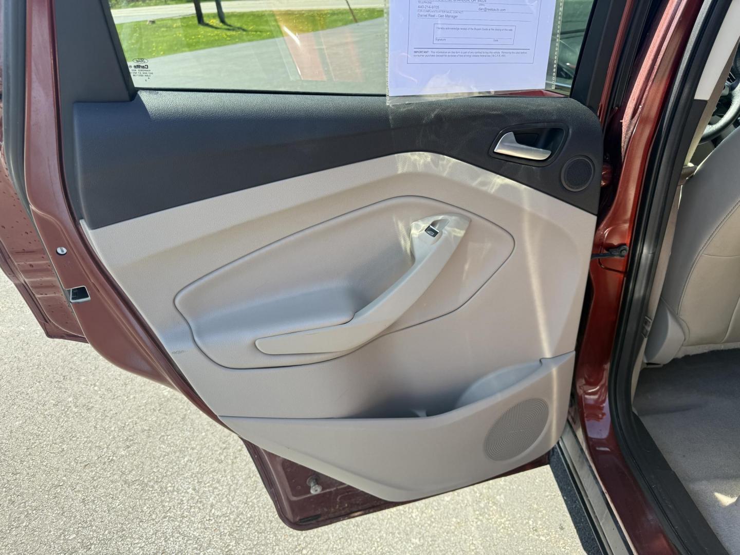 2014 Sunset Metallic /Tan Ford Escape Titanium 4WD (1FMCU9JX7EU) with an 1.6L I4 DOHC 16V TURBO engine, 6-Speed Automatic transmission, located at 547 E. Main St., Orwell, OH, 44076, (440) 437-5893, 41.535435, -80.847855 - This 2014 Ford Escape is a well equipped compact SUV. With a 1.6L EcoBoost turbocharged I4 engine paired with a 6-speed automatic transmission, delivering an impressive 30 MPG on the highway. It offers a luxurious interior with leather seats, heated front seats, and dual-zone automatic climate contr - Photo#33