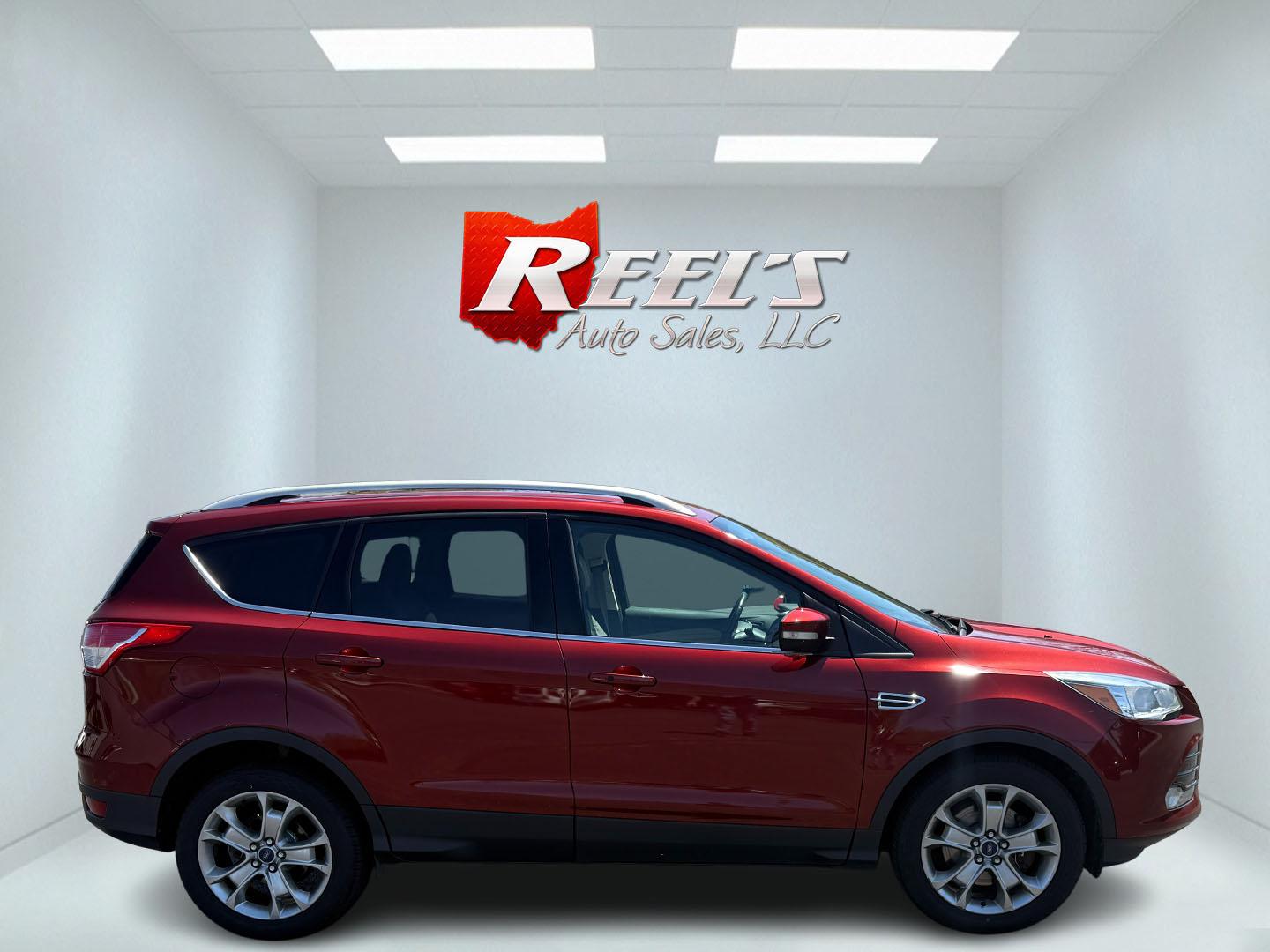 2014 Sunset Metallic /Tan Ford Escape Titanium 4WD (1FMCU9JX7EU) with an 1.6L I4 DOHC 16V TURBO engine, 6-Speed Automatic transmission, located at 547 E. Main St., Orwell, OH, 44076, (440) 437-5893, 41.535435, -80.847855 - This 2014 Ford Escape is a well equipped compact SUV. With a 1.6L EcoBoost turbocharged I4 engine paired with a 6-speed automatic transmission, delivering an impressive 30 MPG on the highway. It offers a luxurious interior with leather seats, heated front seats, and dual-zone automatic climate contr - Photo#45