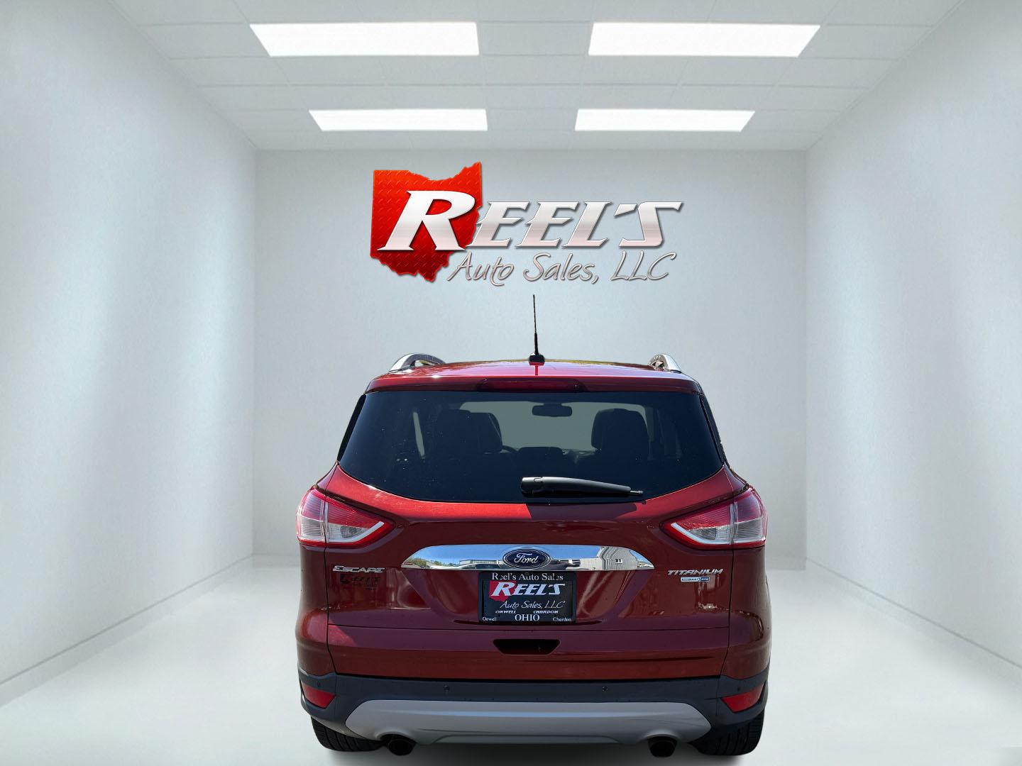 2014 Sunset Metallic /Tan Ford Escape Titanium 4WD (1FMCU9JX7EU) with an 1.6L I4 DOHC 16V TURBO engine, 6-Speed Automatic transmission, located at 547 E. Main St., Orwell, OH, 44076, (440) 437-5893, 41.535435, -80.847855 - This 2014 Ford Escape is a well equipped compact SUV. With a 1.6L EcoBoost turbocharged I4 engine paired with a 6-speed automatic transmission, delivering an impressive 30 MPG on the highway. It offers a luxurious interior with leather seats, heated front seats, and dual-zone automatic climate contr - Photo#46