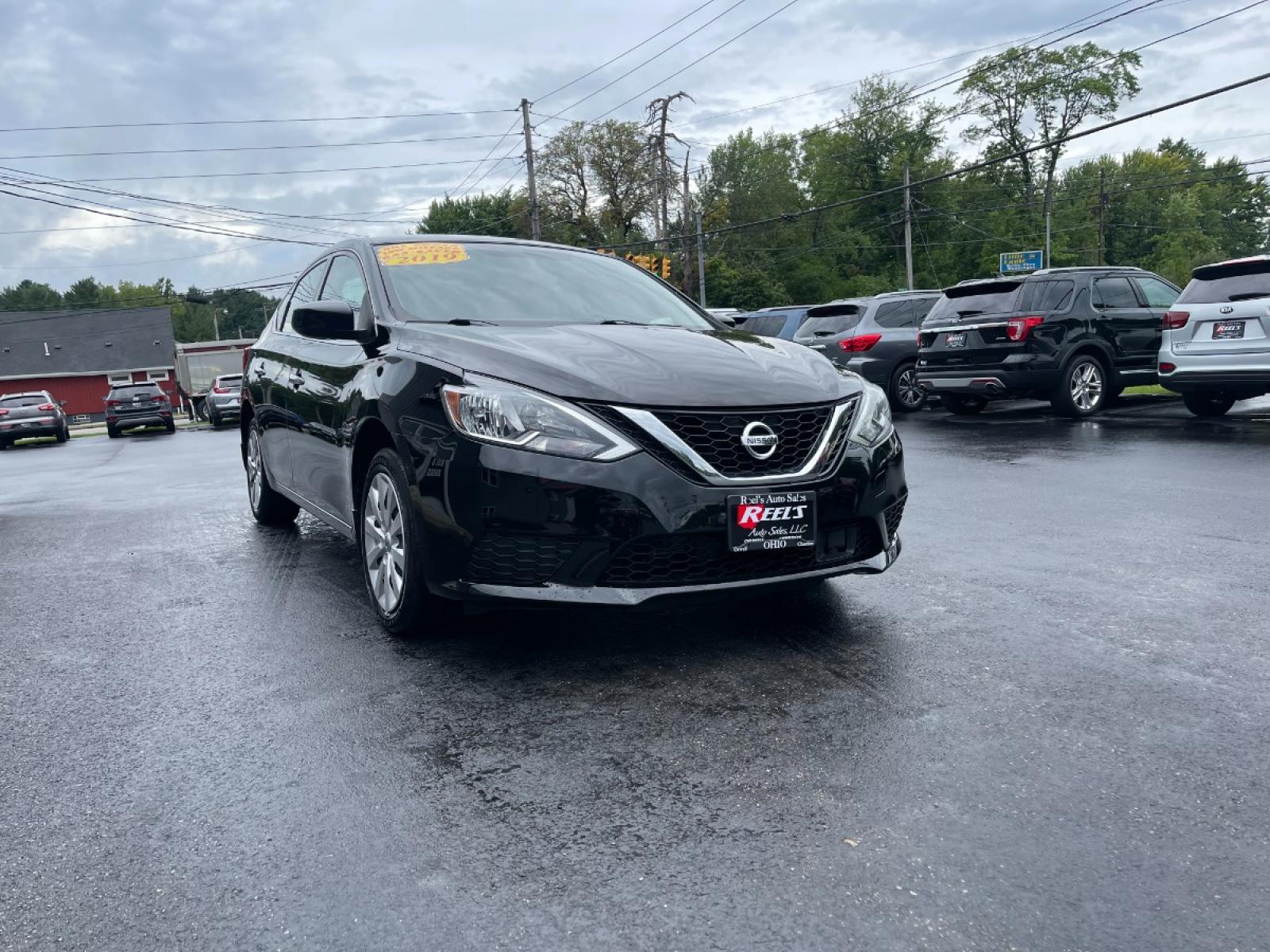 2019 Black /Black Nissan Sentra S CVT (3N1AB7AP5KY) with an 1.8L L4 SFI DOHC 16V engine, CVT transmission, located at 547 E. Main St., Orwell, OH, 44076, (440) 437-5893, 41.535435, -80.847855 - 2019 Nissan Sentra ---- One Owner Carfax ---- 37K Miles ---- Fully Serviced and Detailed ---- Reel's Auto Sales is located in both Chardon and Orwell Ohio. Financing available and trades welcome. Please call or text to confirm location, set an appointment or discuss financing or trades. Chardon 440- - Photo #4