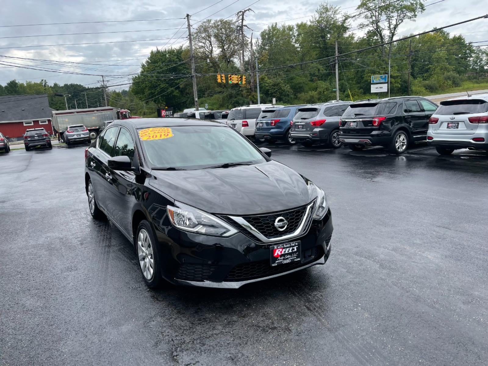 2019 Black /Black Nissan Sentra S CVT (3N1AB7AP5KY) with an 1.8L L4 SFI DOHC 16V engine, CVT transmission, located at 547 E. Main St., Orwell, OH, 44076, (440) 437-5893, 41.535435, -80.847855 - 2019 Nissan Sentra ---- One Owner Carfax ---- 37K Miles ---- Fully Serviced and Detailed ---- Reel's Auto Sales is located in both Chardon and Orwell Ohio. Financing available and trades welcome. Please call or text to confirm location, set an appointment or discuss financing or trades. Chardon 440- - Photo #5