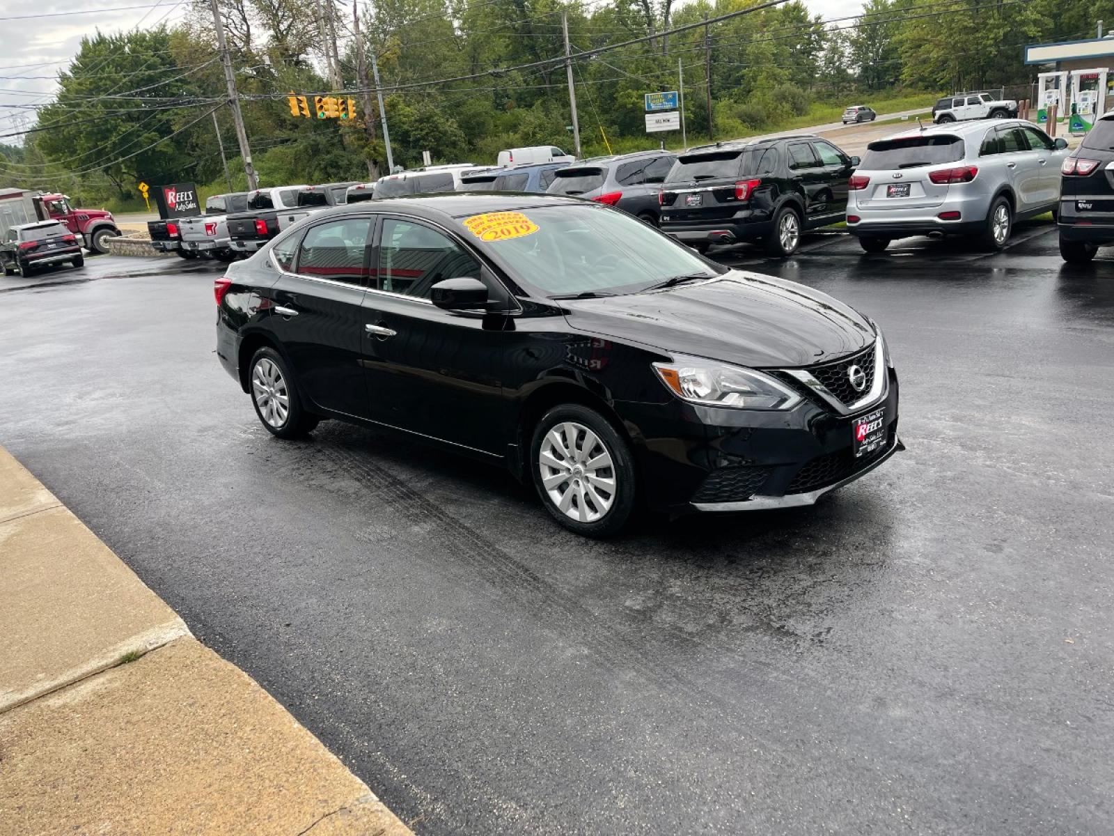 2019 Black /Black Nissan Sentra S CVT (3N1AB7AP5KY) with an 1.8L L4 SFI DOHC 16V engine, CVT transmission, located at 547 E. Main St., Orwell, OH, 44076, (440) 437-5893, 41.535435, -80.847855 - 2019 Nissan Sentra ---- One Owner Carfax ---- 37K Miles ---- Fully Serviced and Detailed ---- Reel's Auto Sales is located in both Chardon and Orwell Ohio. Financing available and trades welcome. Please call or text to confirm location, set an appointment or discuss financing or trades. Chardon 440- - Photo #6