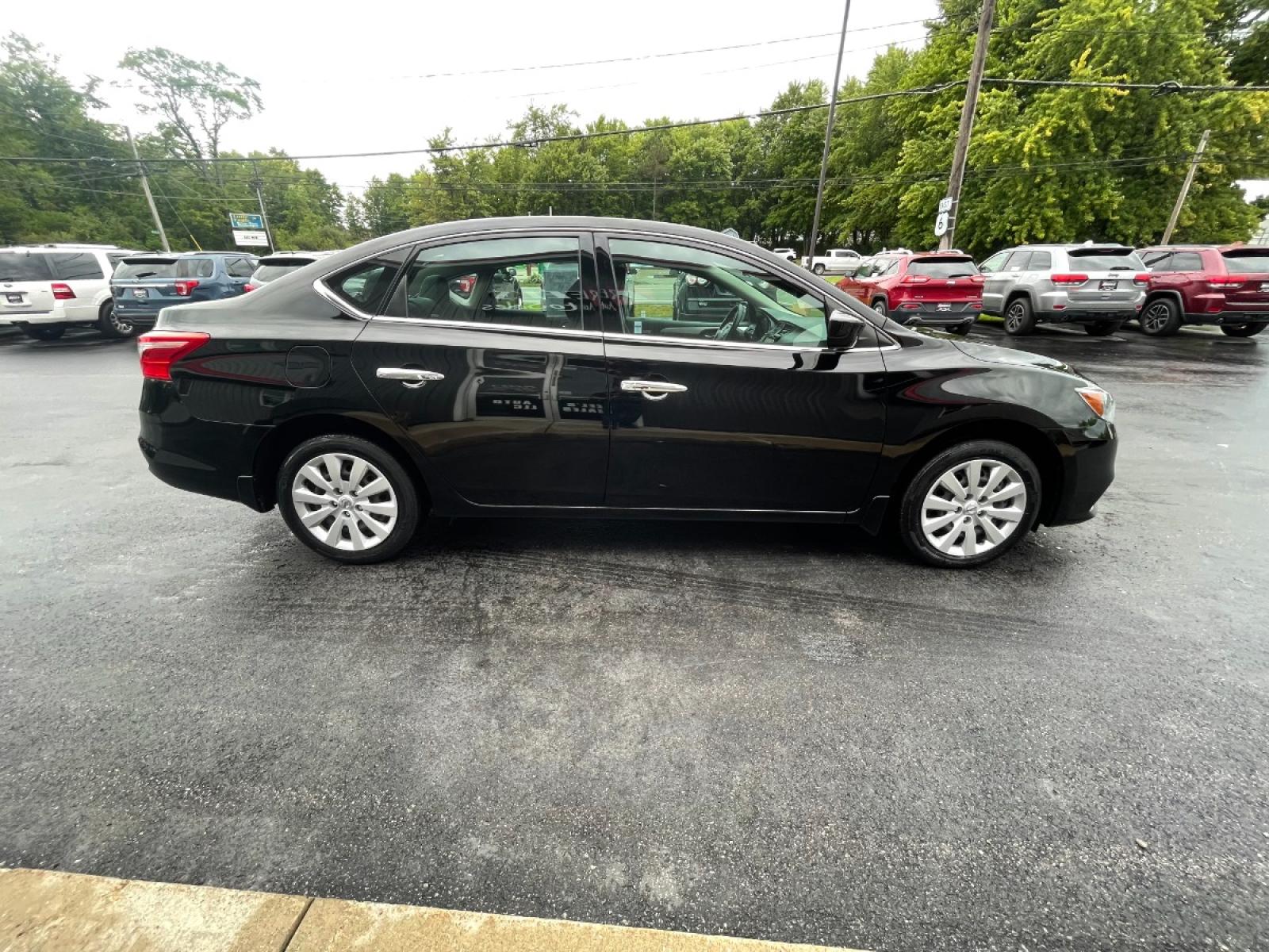 2019 Black /Black Nissan Sentra S CVT (3N1AB7AP5KY) with an 1.8L L4 SFI DOHC 16V engine, CVT transmission, located at 547 E. Main St., Orwell, OH, 44076, (440) 437-5893, 41.535435, -80.847855 - 2019 Nissan Sentra ---- One Owner Carfax ---- 37K Miles ---- Fully Serviced and Detailed ---- Reel's Auto Sales is located in both Chardon and Orwell Ohio. Financing available and trades welcome. Please call or text to confirm location, set an appointment or discuss financing or trades. Chardon 440- - Photo #8