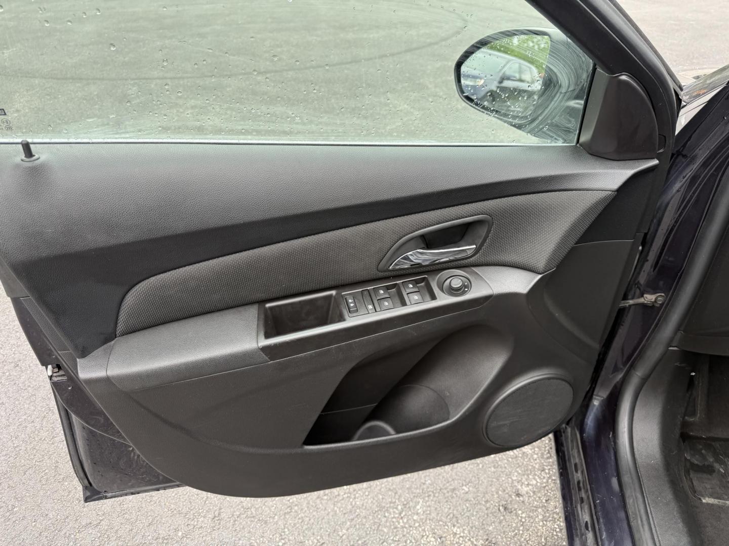 2015 Blue /Black Chevrolet Cruze 2LT Auto (1G1PE5SB7F7) with an 1.4L I4 DOHC 16V TURBO engine, 6-Speed Automatic transmission, located at 547 E. Main St., Orwell, OH, 44076, (440) 437-5893, 41.535435, -80.847855 - This 2015 Chevrolet Cruze is a nicely optioned compact car. Powered by a 1.4 I4 Turbocharged EcoTec engine and a 6 speed automatic transmission it achieves a very respectable 36 MPG highway. On the inside you get a leather interior, power drivers seat and, heated seats. This Car also has remote star - Photo#9