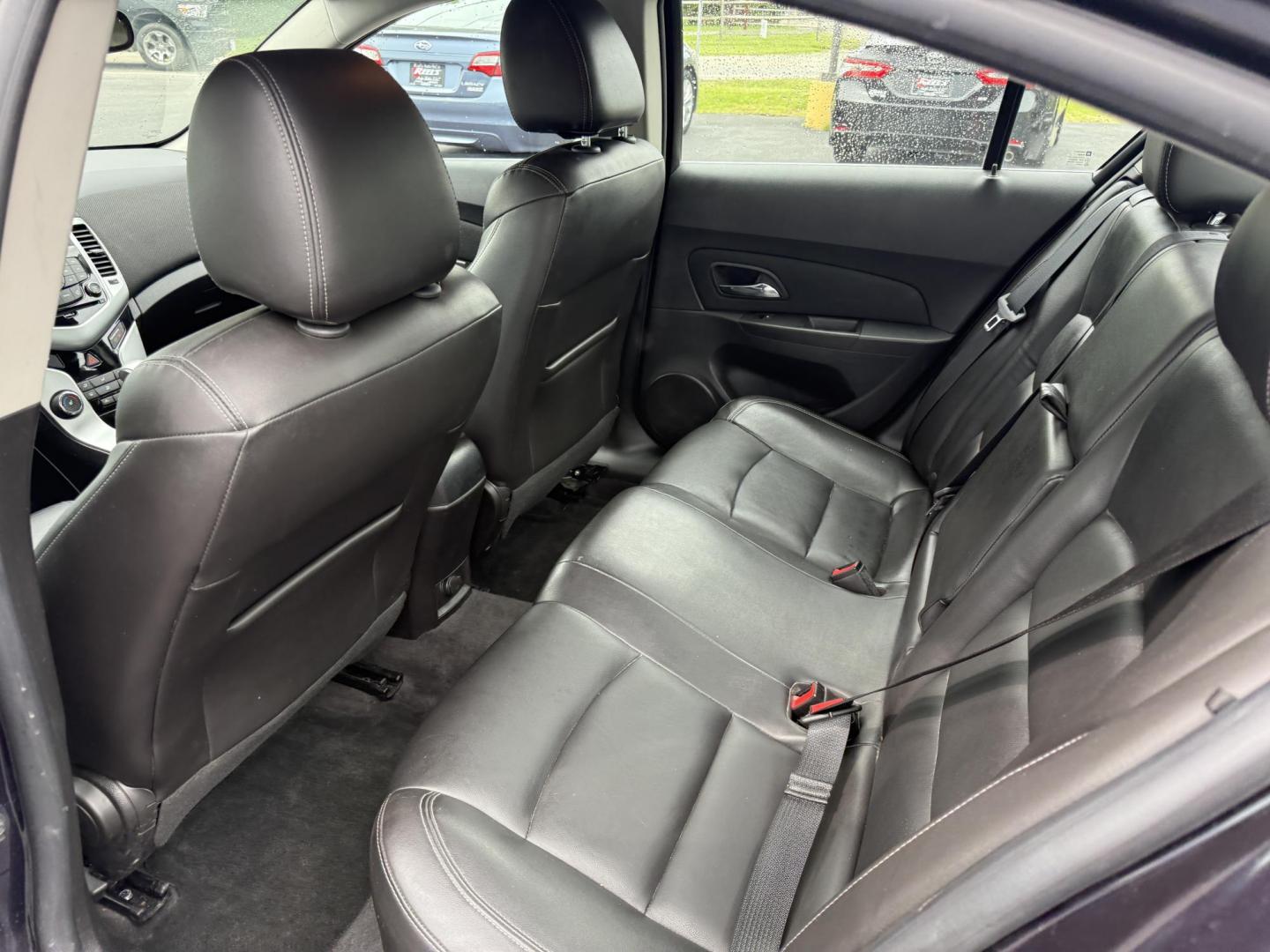 2015 Blue /Black Chevrolet Cruze 2LT Auto (1G1PE5SB7F7) with an 1.4L I4 DOHC 16V TURBO engine, 6-Speed Automatic transmission, located at 547 E. Main St., Orwell, OH, 44076, (440) 437-5893, 41.535435, -80.847855 - This 2015 Chevrolet Cruze is a nicely optioned compact car. Powered by a 1.4 I4 Turbocharged EcoTec engine and a 6 speed automatic transmission it achieves a very respectable 36 MPG highway. On the inside you get a leather interior, power drivers seat and, heated seats. This Car also has remote star - Photo#23