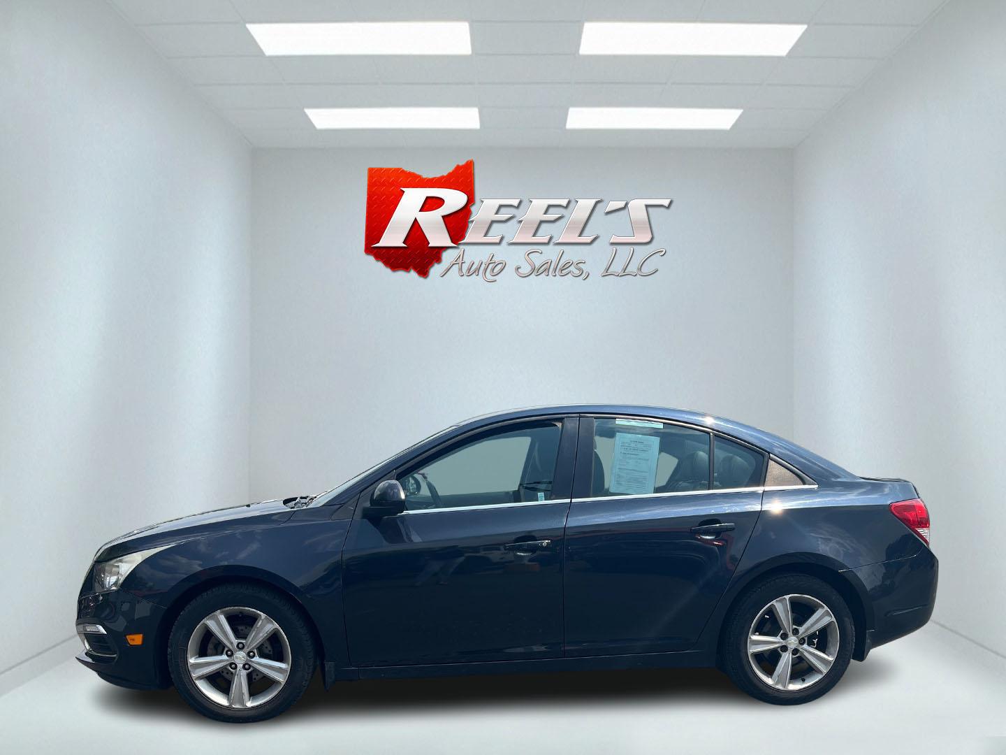 2015 Blue /Black Chevrolet Cruze 2LT Auto (1G1PE5SB7F7) with an 1.4L I4 DOHC 16V TURBO engine, 6-Speed Automatic transmission, located at 547 E. Main St., Orwell, OH, 44076, (440) 437-5893, 41.535435, -80.847855 - This 2015 Chevrolet Cruze is a nicely optioned compact car. Powered by a 1.4 I4 Turbocharged EcoTec engine and a 6 speed automatic transmission it achieves a very respectable 36 MPG highway. On the inside you get a leather interior, power drivers seat and, heated seats. This Car also has remote star - Photo#13