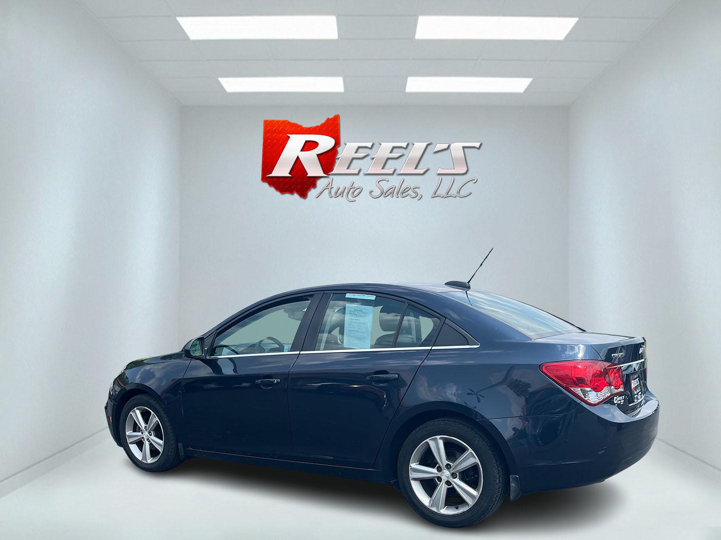 2015 Blue /Black Chevrolet Cruze 2LT Auto (1G1PE5SB7F7) with an 1.4L I4 DOHC 16V TURBO engine, 6-Speed Automatic transmission, located at 547 E. Main St., Orwell, OH, 44076, (440) 437-5893, 41.535435, -80.847855 - This 2015 Chevrolet Cruze is a nicely optioned compact car. Powered by a 1.4 I4 Turbocharged EcoTec engine and a 6 speed automatic transmission it achieves a very respectable 36 MPG highway. On the inside you get a leather interior, power drivers seat and, heated seats. This Car also has remote star - Photo#12