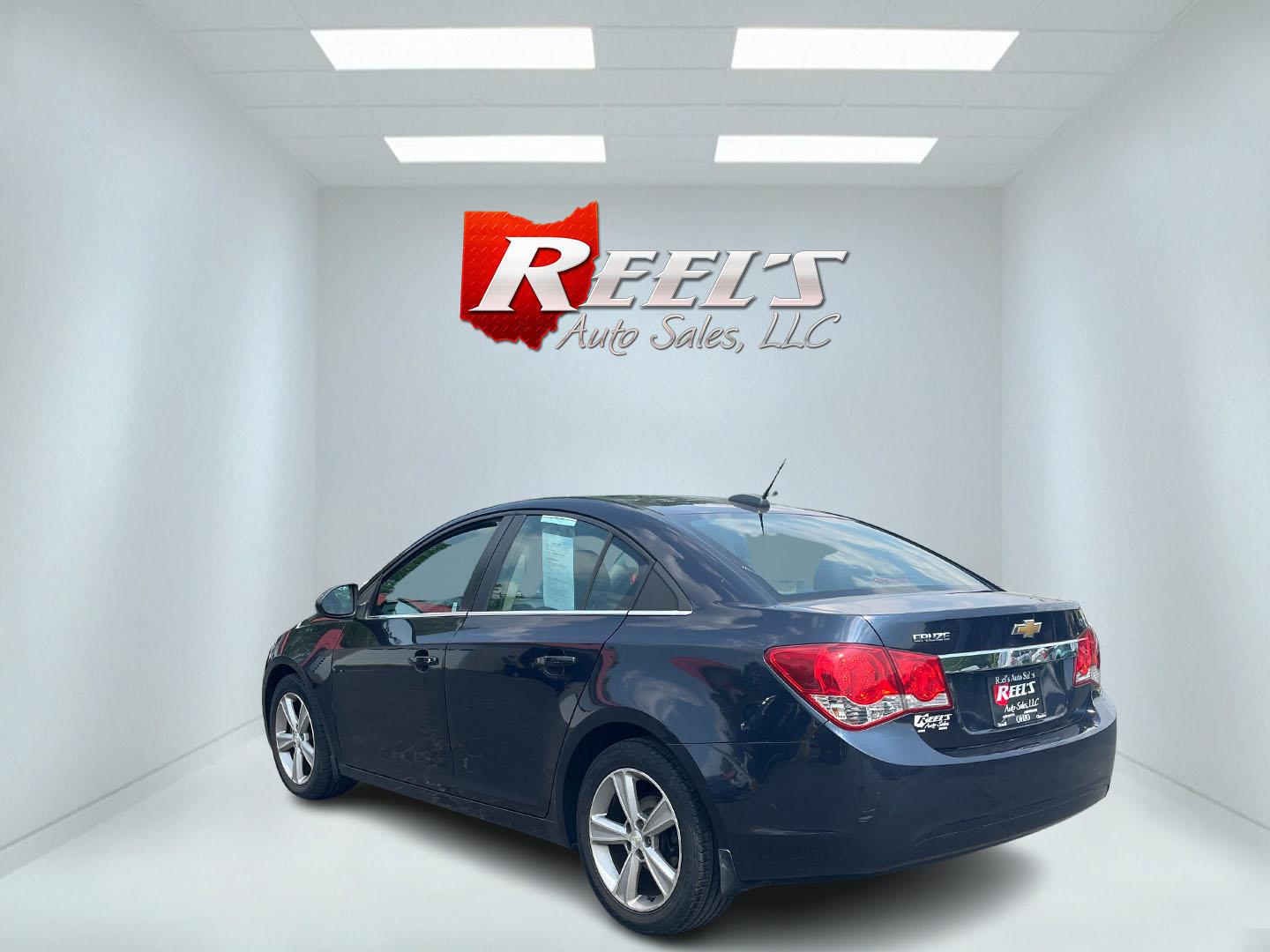 2015 Blue /Black Chevrolet Cruze 2LT Auto (1G1PE5SB7F7) with an 1.4L I4 DOHC 16V TURBO engine, 6-Speed Automatic transmission, located at 547 E. Main St., Orwell, OH, 44076, (440) 437-5893, 41.535435, -80.847855 - This 2015 Chevrolet Cruze is a nicely optioned compact car. Powered by a 1.4 I4 Turbocharged EcoTec engine and a 6 speed automatic transmission it achieves a very respectable 36 MPG highway. On the inside you get a leather interior, power drivers seat and, heated seats. This Car also has remote star - Photo#34
