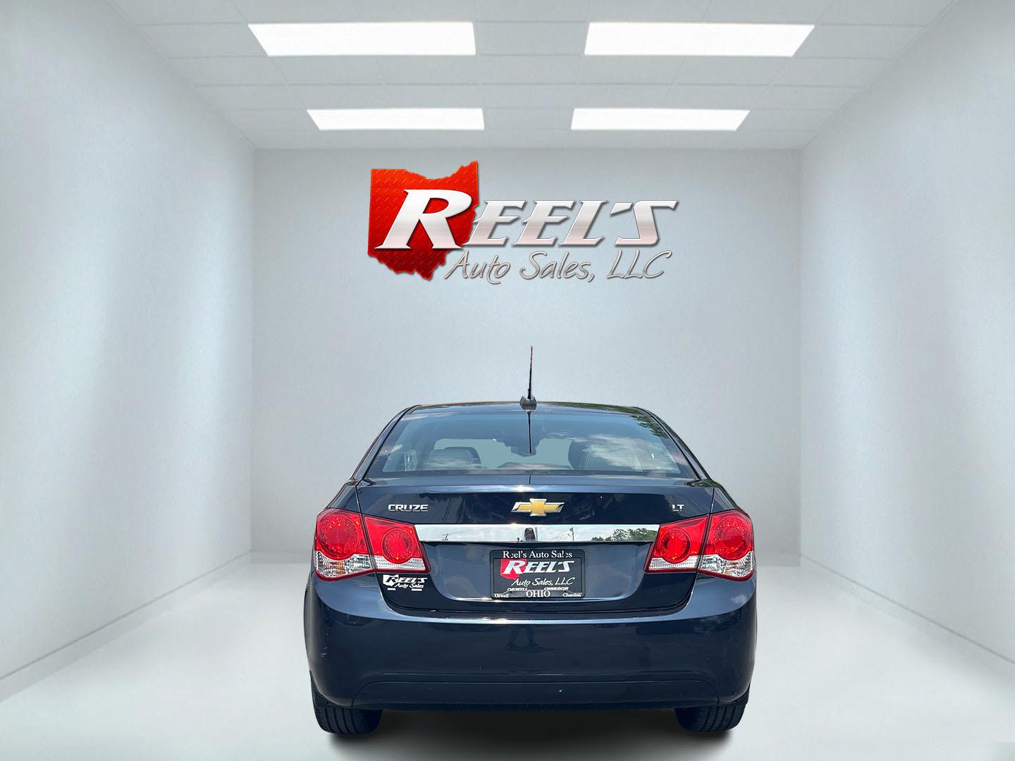 2015 Blue /Black Chevrolet Cruze 2LT Auto (1G1PE5SB7F7) with an 1.4L I4 DOHC 16V TURBO engine, 6-Speed Automatic transmission, located at 547 E. Main St., Orwell, OH, 44076, (440) 437-5893, 41.535435, -80.847855 - This 2015 Chevrolet Cruze is a nicely optioned compact car. Powered by a 1.4 I4 Turbocharged EcoTec engine and a 6 speed automatic transmission it achieves a very respectable 36 MPG highway. On the inside you get a leather interior, power drivers seat and, heated seats. This Car also has remote star - Photo#35