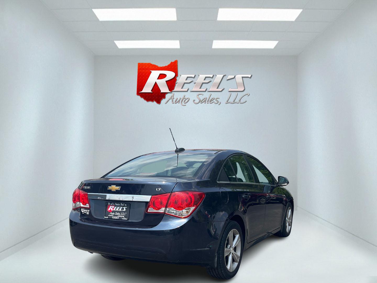 2015 Blue /Black Chevrolet Cruze 2LT Auto (1G1PE5SB7F7) with an 1.4L I4 DOHC 16V TURBO engine, 6-Speed Automatic transmission, located at 547 E. Main St., Orwell, OH, 44076, (440) 437-5893, 41.535435, -80.847855 - This 2015 Chevrolet Cruze is a nicely optioned compact car. Powered by a 1.4 I4 Turbocharged EcoTec engine and a 6 speed automatic transmission it achieves a very respectable 36 MPG highway. On the inside you get a leather interior, power drivers seat and, heated seats. This Car also has remote star - Photo#36