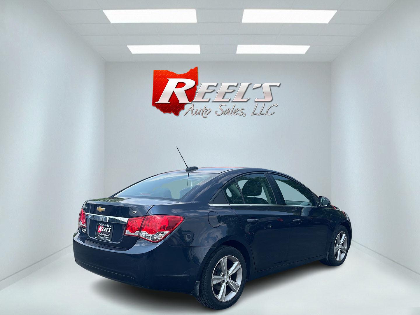 2015 Blue /Black Chevrolet Cruze 2LT Auto (1G1PE5SB7F7) with an 1.4L I4 DOHC 16V TURBO engine, 6-Speed Automatic transmission, located at 547 E. Main St., Orwell, OH, 44076, (440) 437-5893, 41.535435, -80.847855 - This 2015 Chevrolet Cruze is a nicely optioned compact car. Powered by a 1.4 I4 Turbocharged EcoTec engine and a 6 speed automatic transmission it achieves a very respectable 36 MPG highway. On the inside you get a leather interior, power drivers seat and, heated seats. This Car also has remote star - Photo#37