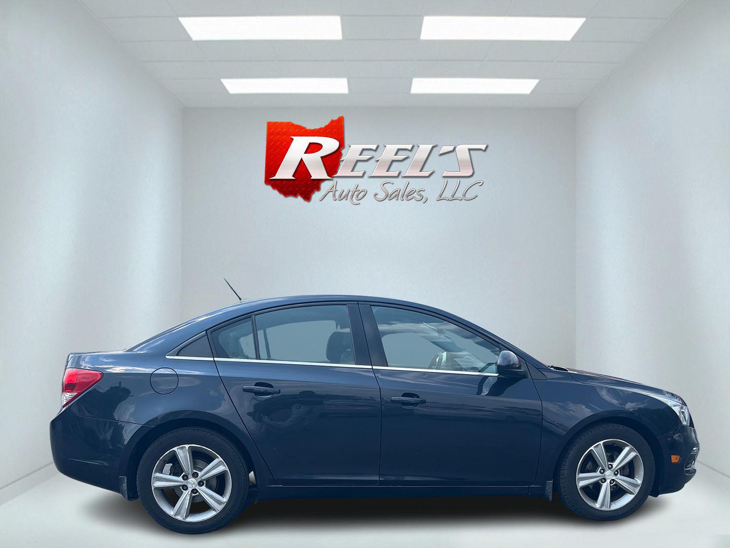 2015 Blue /Black Chevrolet Cruze 2LT Auto (1G1PE5SB7F7) with an 1.4L I4 DOHC 16V TURBO engine, 6-Speed Automatic transmission, located at 547 E. Main St., Orwell, OH, 44076, (440) 437-5893, 41.535435, -80.847855 - This 2015 Chevrolet Cruze is a nicely optioned compact car. Powered by a 1.4 I4 Turbocharged EcoTec engine and a 6 speed automatic transmission it achieves a very respectable 36 MPG highway. On the inside you get a leather interior, power drivers seat and, heated seats. This Car also has remote star - Photo#38