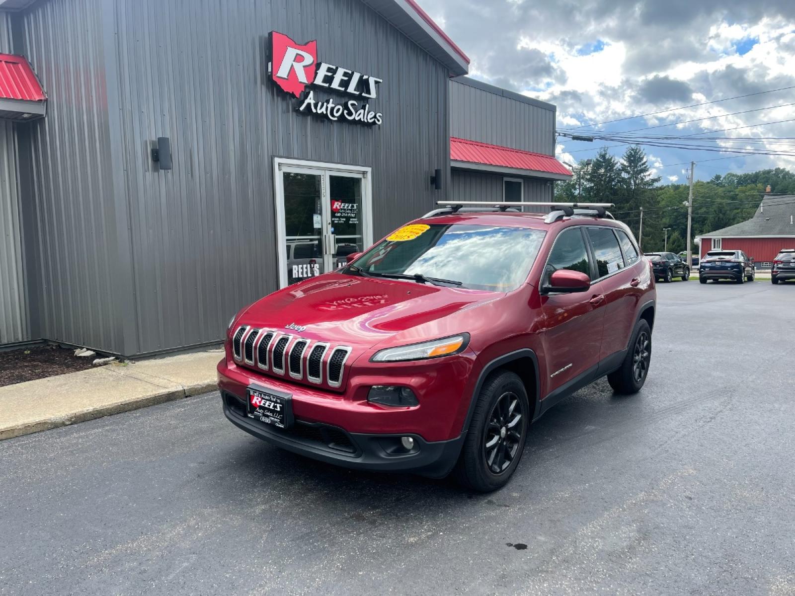 2015 Red /Black Jeep Cherokee Latitude 4WD (1C4PJMCS8FW) with an 3.2L V6 DOHC 24V engine, 9-Speed Automatic transmission, located at 547 E. Main St., Orwell, OH, 44076, (440) 437-5893, 41.535435, -80.847855 - Photo #1