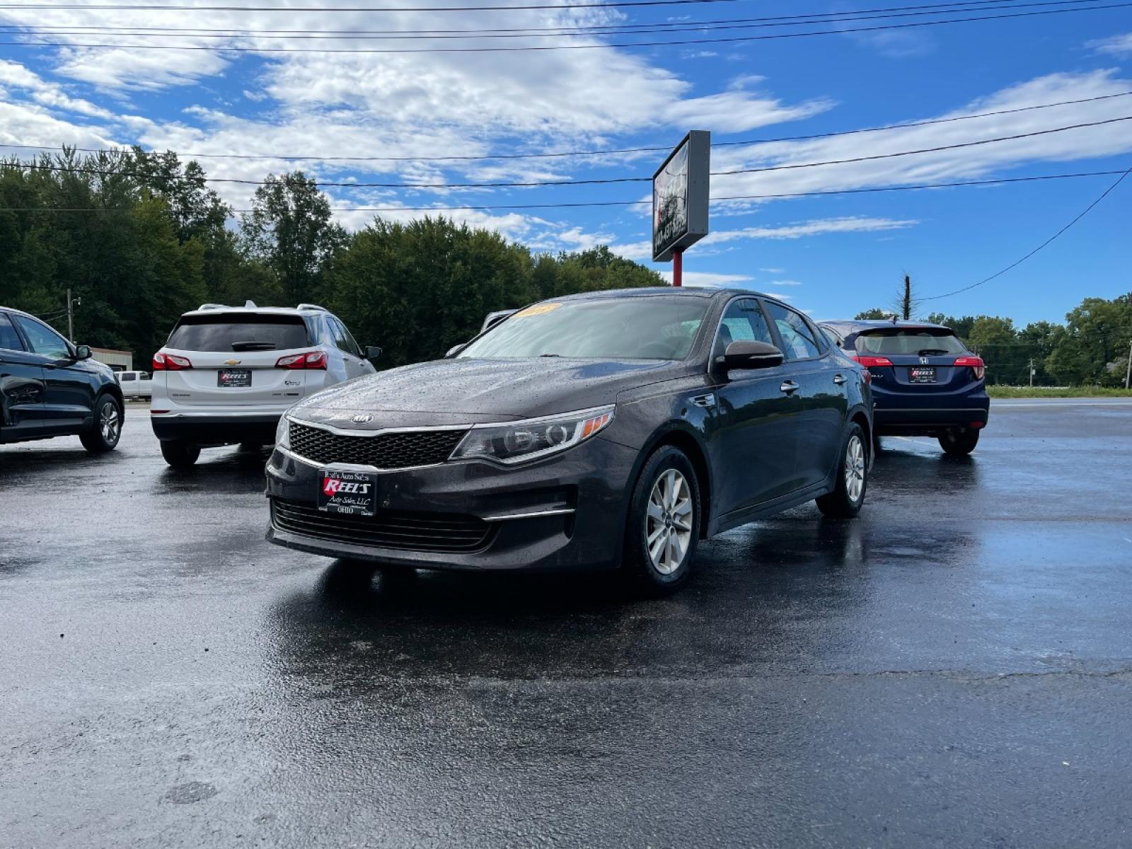 2018 Brown /Black Kia Optima LX (KNAGT4L3XJ5) with an 2.4L I4 DOHC 16V engine, 6-Speed Automatic transmission, located at 11115 Chardon Rd. , Chardon, OH, 44024, (440) 214-9705, 41.580246, -81.241943 - 2018 Kia Optima ---- 29MPG Combined ---- Clean Inside and Out ---- Local Trade In ---- Fully Serviced and Recently Detailed ---- Reel's Auto Sales is located in both Chardon and Orwell Ohio. Financing available and trades welcome. Please call or text to confirm location, set an appointment or discus - Photo #0