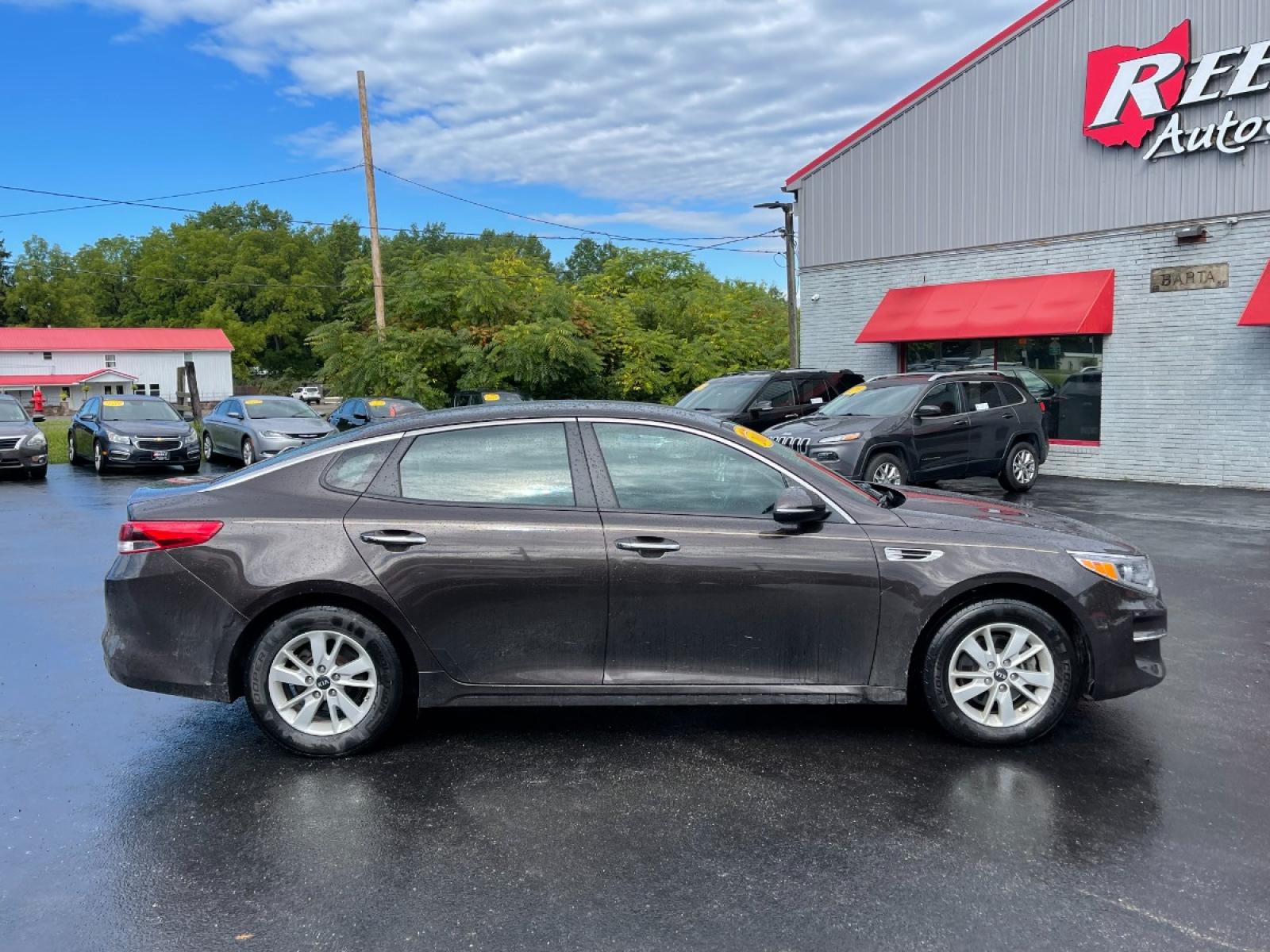 2018 Brown /Black Kia Optima LX (KNAGT4L3XJ5) with an 2.4L I4 DOHC 16V engine, 6-Speed Automatic transmission, located at 11115 Chardon Rd. , Chardon, OH, 44024, (440) 214-9705, 41.580246, -81.241943 - 2018 Kia Optima ---- 29MPG Combined ---- Clean Inside and Out ---- Local Trade In ---- Fully Serviced and Recently Detailed ---- Reel's Auto Sales is located in both Chardon and Orwell Ohio. Financing available and trades welcome. Please call or text to confirm location, set an appointment or discus - Photo #9