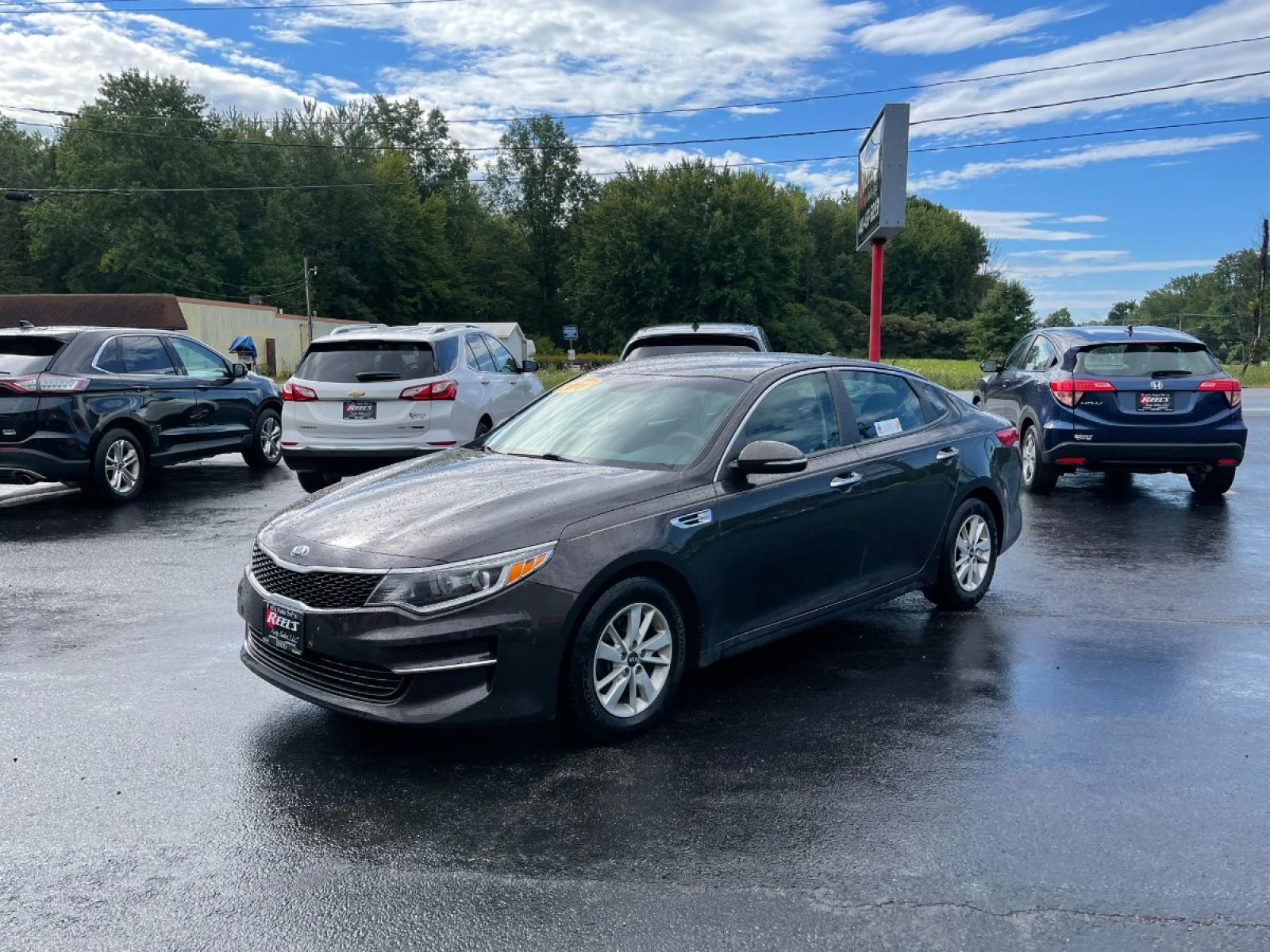2018 Brown /Black Kia Optima LX (KNAGT4L3XJ5) with an 2.4L I4 DOHC 16V engine, 6-Speed Automatic transmission, located at 11115 Chardon Rd. , Chardon, OH, 44024, (440) 214-9705, 41.580246, -81.241943 - 2018 Kia Optima ---- 29MPG Combined ---- Clean Inside and Out ---- Local Trade In ---- Fully Serviced and Recently Detailed ---- Reel's Auto Sales is located in both Chardon and Orwell Ohio. Financing available and trades welcome. Please call or text to confirm location, set an appointment or discus - Photo #21