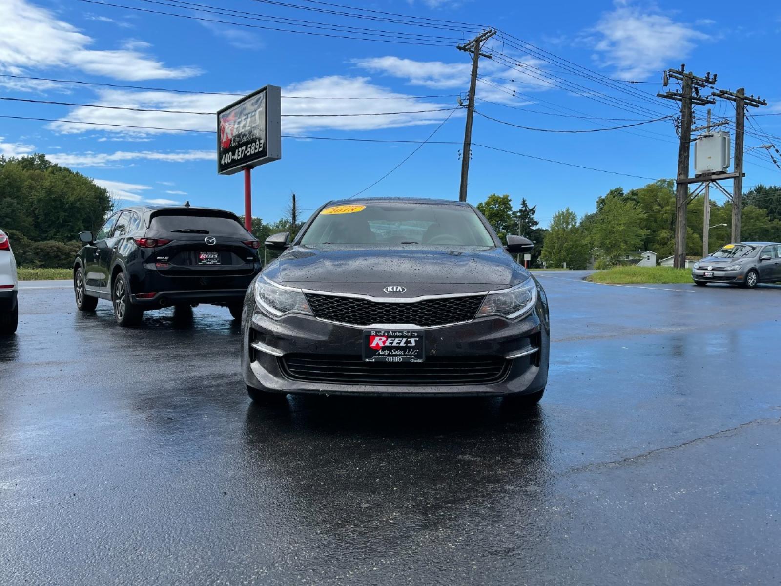 2018 Brown /Black Kia Optima LX (KNAGT4L3XJ5) with an 2.4L I4 DOHC 16V engine, 6-Speed Automatic transmission, located at 11115 Chardon Rd. , Chardon, OH, 44024, (440) 214-9705, 41.580246, -81.241943 - 2018 Kia Optima ---- 29MPG Combined ---- Clean Inside and Out ---- Local Trade In ---- Fully Serviced and Recently Detailed ---- Reel's Auto Sales is located in both Chardon and Orwell Ohio. Financing available and trades welcome. Please call or text to confirm location, set an appointment or discus - Photo #2