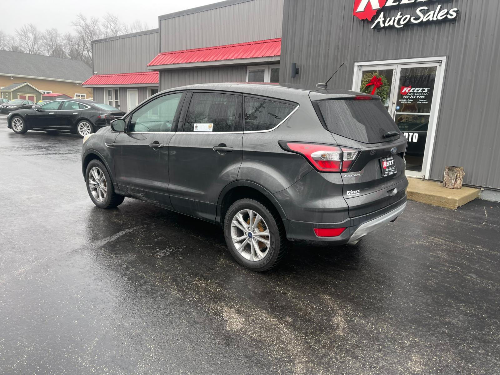 2017 Gray /Black Ford Escape SE 4WD (1FMCU9GD4HU) with an 1.5L I4 DOHC 16V TURBO engine, 6A transmission, located at 11115 Chardon Rd. , Chardon, OH, 44024, (440) 214-9705, 41.580246, -81.241943 - 2017 Ford Escape ---- All Wheel Drive ---- 24 MPG Combined ---- Fully Serviced and Recently Detailed ---- Reel's Auto Sales is located in both Chardon and Orwell Ohio. Financing available and trades welcome. Please call or text to confirm location, set an appointment or discuss financing or trades. - Photo #11