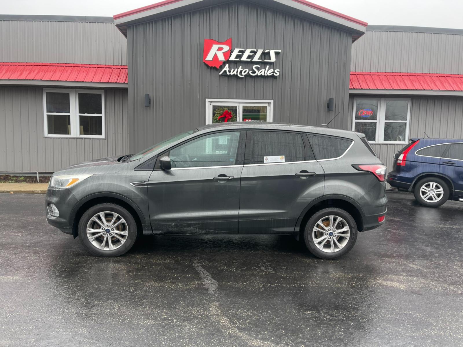 2017 Gray /Black Ford Escape SE 4WD (1FMCU9GD4HU) with an 1.5L I4 DOHC 16V TURBO engine, 6A transmission, located at 11115 Chardon Rd. , Chardon, OH, 44024, (440) 214-9705, 41.580246, -81.241943 - 2017 Ford Escape ---- All Wheel Drive ---- 24 MPG Combined ---- Fully Serviced and Recently Detailed ---- Reel's Auto Sales is located in both Chardon and Orwell Ohio. Financing available and trades welcome. Please call or text to confirm location, set an appointment or discuss financing or trades. - Photo #14