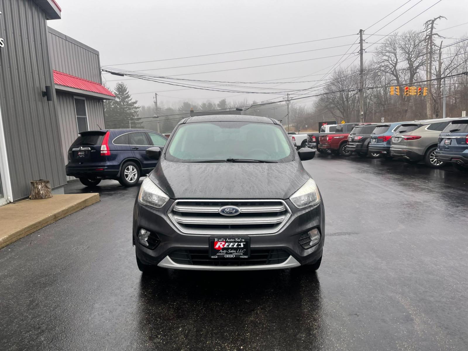 2017 Gray /Black Ford Escape SE 4WD (1FMCU9GD4HU) with an 1.5L I4 DOHC 16V TURBO engine, 6A transmission, located at 11115 Chardon Rd. , Chardon, OH, 44024, (440) 214-9705, 41.580246, -81.241943 - 2017 Ford Escape ---- All Wheel Drive ---- 24 MPG Combined ---- Fully Serviced and Recently Detailed ---- Reel's Auto Sales is located in both Chardon and Orwell Ohio. Financing available and trades welcome. Please call or text to confirm location, set an appointment or discuss financing or trades. - Photo #1