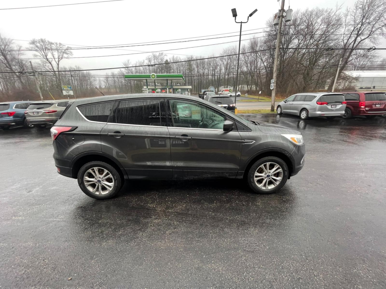 2017 Gray /Black Ford Escape SE 4WD (1FMCU9GD4HU) with an 1.5L I4 DOHC 16V TURBO engine, 6A transmission, located at 11115 Chardon Rd. , Chardon, OH, 44024, (440) 214-9705, 41.580246, -81.241943 - 2017 Ford Escape ---- All Wheel Drive ---- 24 MPG Combined ---- Fully Serviced and Recently Detailed ---- Reel's Auto Sales is located in both Chardon and Orwell Ohio. Financing available and trades welcome. Please call or text to confirm location, set an appointment or discuss financing or trades. - Photo #5