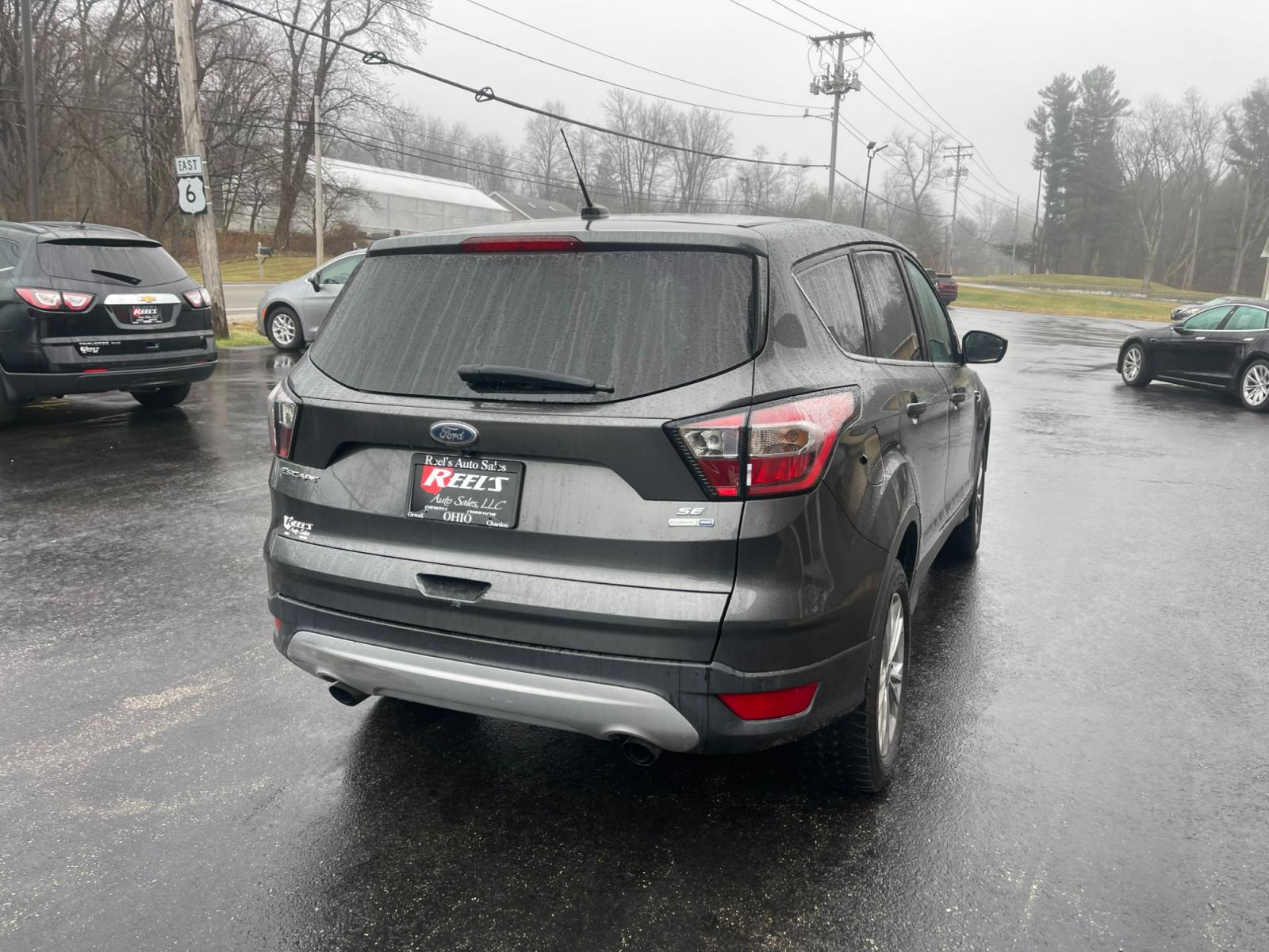 2017 Gray /Black Ford Escape SE 4WD (1FMCU9GD4HU) with an 1.5L I4 DOHC 16V TURBO engine, 6A transmission, located at 11115 Chardon Rd. , Chardon, OH, 44024, (440) 214-9705, 41.580246, -81.241943 - 2017 Ford Escape ---- All Wheel Drive ---- 24 MPG Combined ---- Fully Serviced and Recently Detailed ---- Reel's Auto Sales is located in both Chardon and Orwell Ohio. Financing available and trades welcome. Please call or text to confirm location, set an appointment or discuss financing or trades. - Photo #8