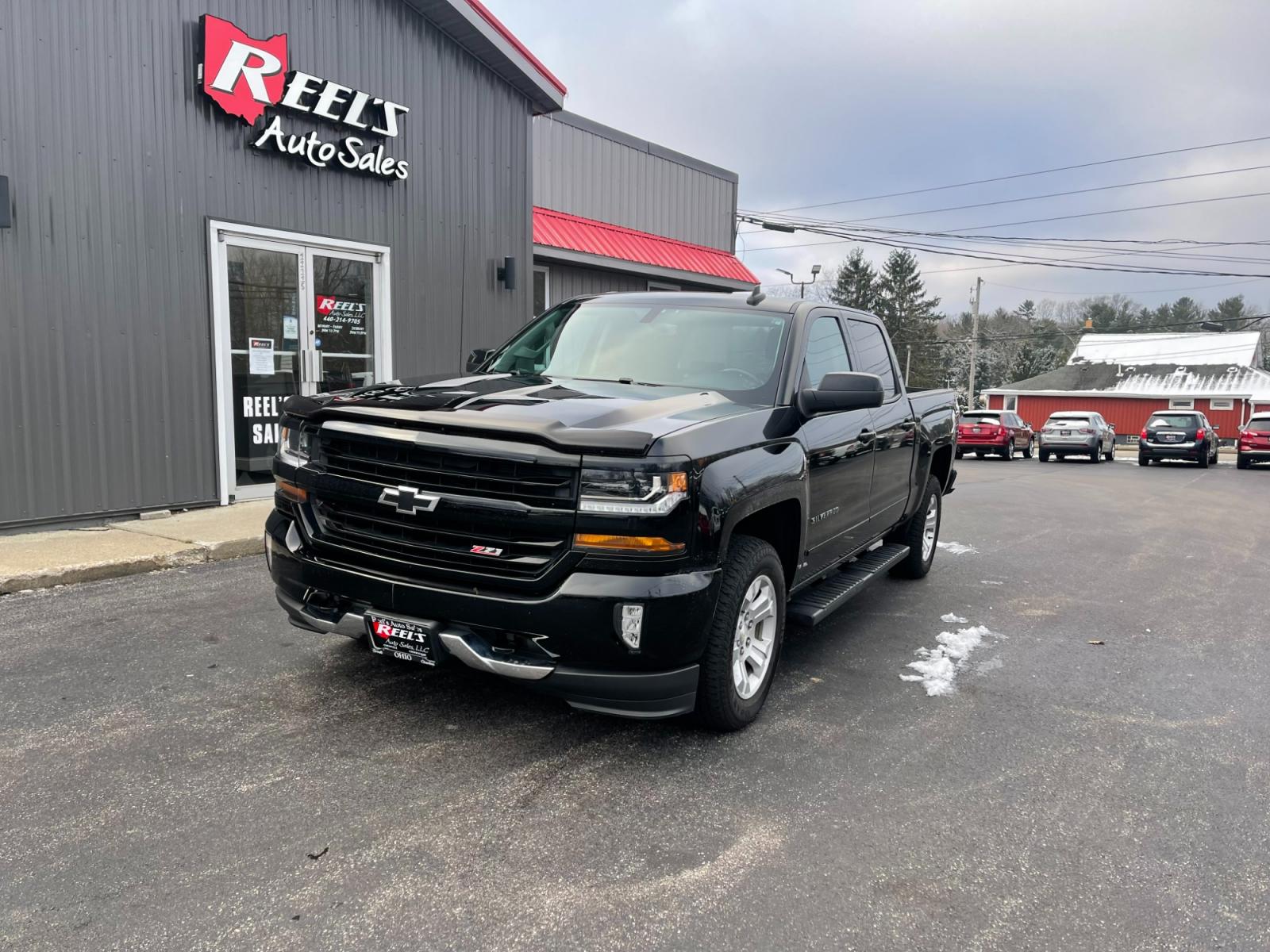 2018 Black /Black Chevrolet Silverado 1500 2LT Crew Cab 4WD (3GCUKREC9JG) with an 5.3L V8 OHV 16V engine, 6A transmission, located at 11115 Chardon Rd. , Chardon, OH, 44024, (440) 214-9705, 41.580246, -81.241943 - 2018 Chevrolet Silverado 1500 2LT ---- One Owner Carfax ---- Crew Cab ---- Heated Front Seats ---- Z71 Package ---- 5.3 V8 ---- Fully Serviced and Recently Detailed ---- Reel's Auto Sales is located in both Chardon and Orwell Ohio. Financing available and trades welcome. Please call or text to confi - Photo #1
