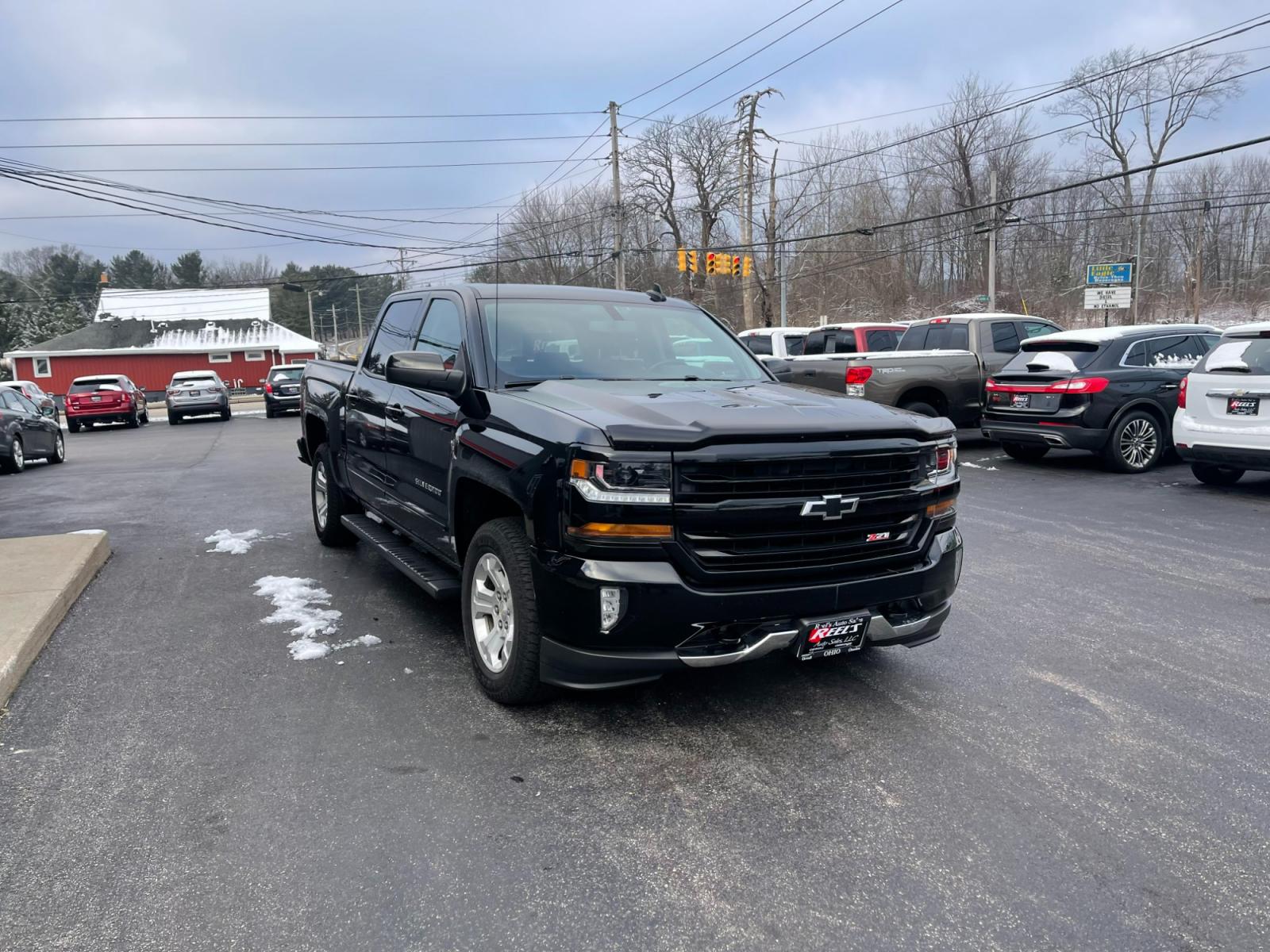 2018 Black /Black Chevrolet Silverado 1500 2LT Crew Cab 4WD (3GCUKREC9JG) with an 5.3L V8 OHV 16V engine, 6A transmission, located at 11115 Chardon Rd. , Chardon, OH, 44024, (440) 214-9705, 41.580246, -81.241943 - 2018 Chevrolet Silverado 1500 2LT ---- One Owner Carfax ---- Crew Cab ---- Heated Front Seats ---- Z71 Package ---- 5.3 V8 ---- Fully Serviced and Recently Detailed ---- Reel's Auto Sales is located in both Chardon and Orwell Ohio. Financing available and trades welcome. Please call or text to confi - Photo #3