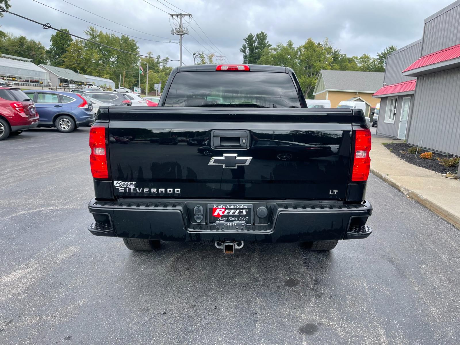 2018 Black /Black Chevrolet Silverado 1500 2LT Crew Cab 4WD (3GCUKREC9JG) with an 5.3L V8 OHV 16V engine, 6A transmission, located at 11115 Chardon Rd. , Chardon, OH, 44024, (440) 214-9705, 41.580246, -81.241943 - The 2018 Chevrolet Silverado 2LT Crew Cab Z71 5.3 comes with a powerful 5.3-liter V8 engine that generates 355 horsepower and 383 lb-ft of torque. It has a towing capacity of up to 9,100 pounds and can go from 0 to 60 mph in 6.7 seconds. The Z71 package includes off-road suspension, skid plates, and - Photo #9