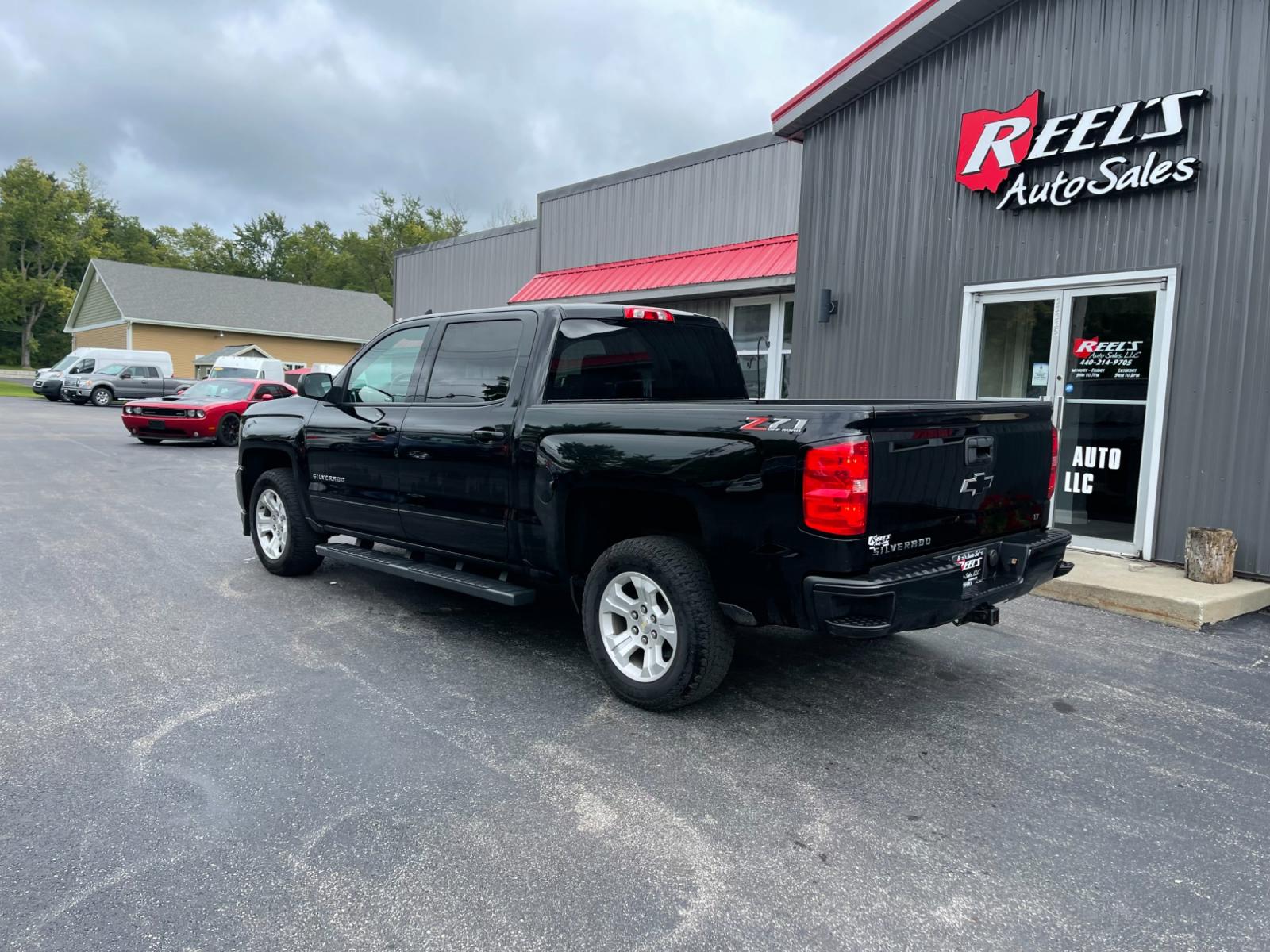 2018 Black /Black Chevrolet Silverado 1500 2LT Crew Cab 4WD (3GCUKREC9JG) with an 5.3L V8 OHV 16V engine, 6A transmission, located at 11115 Chardon Rd. , Chardon, OH, 44024, (440) 214-9705, 41.580246, -81.241943 - The 2018 Chevrolet Silverado 2LT Crew Cab Z71 5.3 comes with a powerful 5.3-liter V8 engine that generates 355 horsepower and 383 lb-ft of torque. It has a towing capacity of up to 9,100 pounds and can go from 0 to 60 mph in 6.7 seconds. The Z71 package includes off-road suspension, skid plates, and - Photo #12