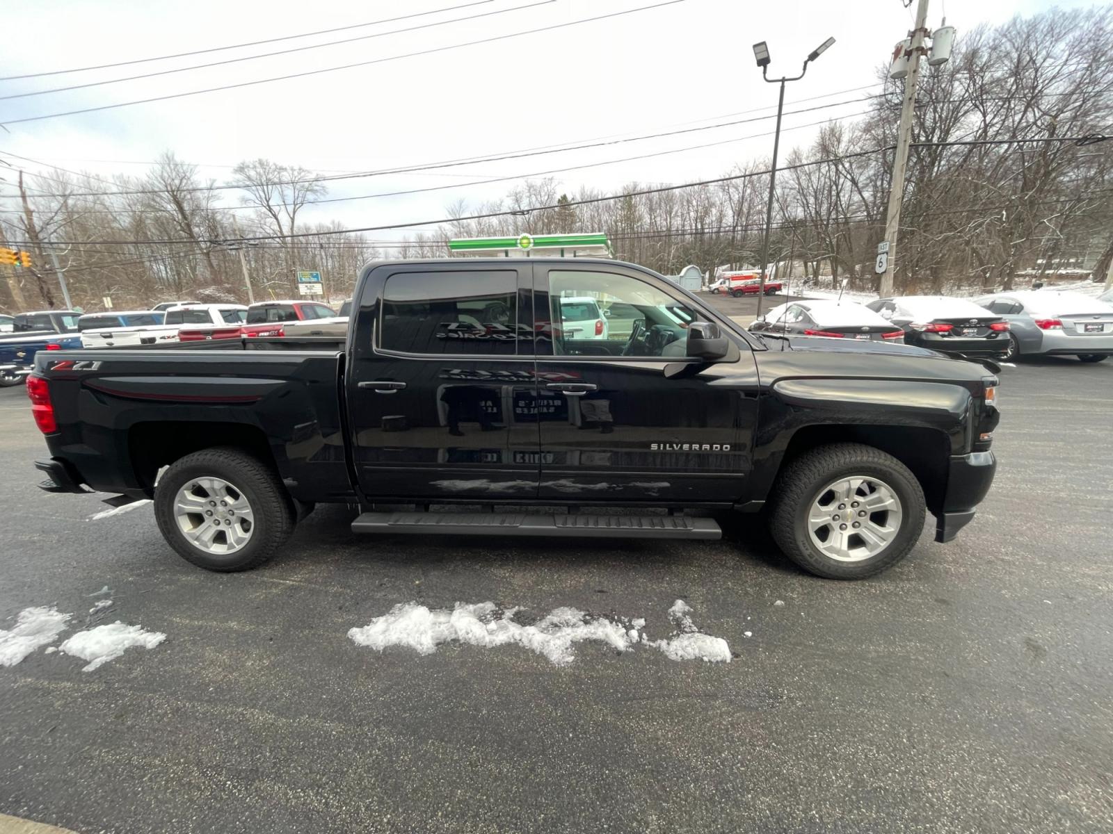 2018 Black /Black Chevrolet Silverado 1500 2LT Crew Cab 4WD (3GCUKREC9JG) with an 5.3L V8 OHV 16V engine, 6A transmission, located at 11115 Chardon Rd. , Chardon, OH, 44024, (440) 214-9705, 41.580246, -81.241943 - 2018 Chevrolet Silverado 1500 2LT ---- One Owner Carfax ---- Crew Cab ---- Heated Front Seats ---- Z71 Package ---- 5.3 V8 ---- Fully Serviced and Recently Detailed ---- Reel's Auto Sales is located in both Chardon and Orwell Ohio. Financing available and trades welcome. Please call or text to confi - Photo #6