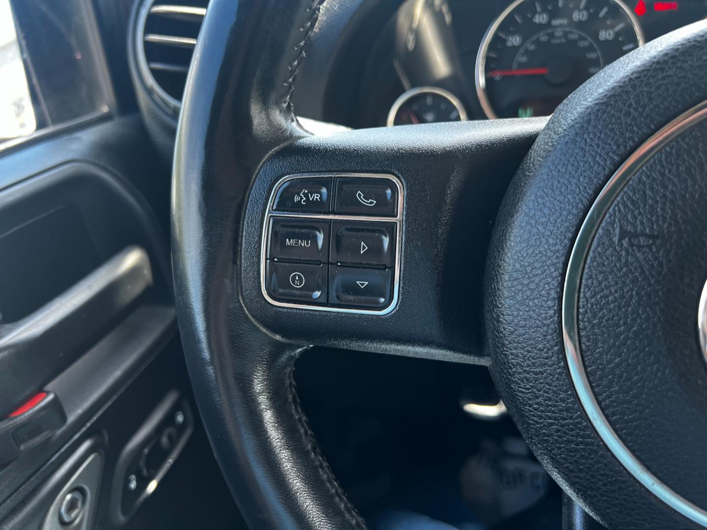2015 Black /Black Jeep Wrangler Unlimited Willys 4WD (1C4BJWDG9FL) with an 3.6L V6 DOHC 24V engine, 6 Speed Manual transmission, located at 11115 Chardon Rd. , Chardon, OH, 44024, (440) 214-9705, 41.580246, -81.241943 - This 2015 Jeep Wrangler Unlimited Willy Wheeler Edition is a capable and well-equipped off-road vehicle. It features a 3.6-liter Pentastar V6 engine paired with a 6-speed manual transmission, offering a traditional driving experience favored by many off-road enthusiasts. The vehicle comes with sever - Photo#19
