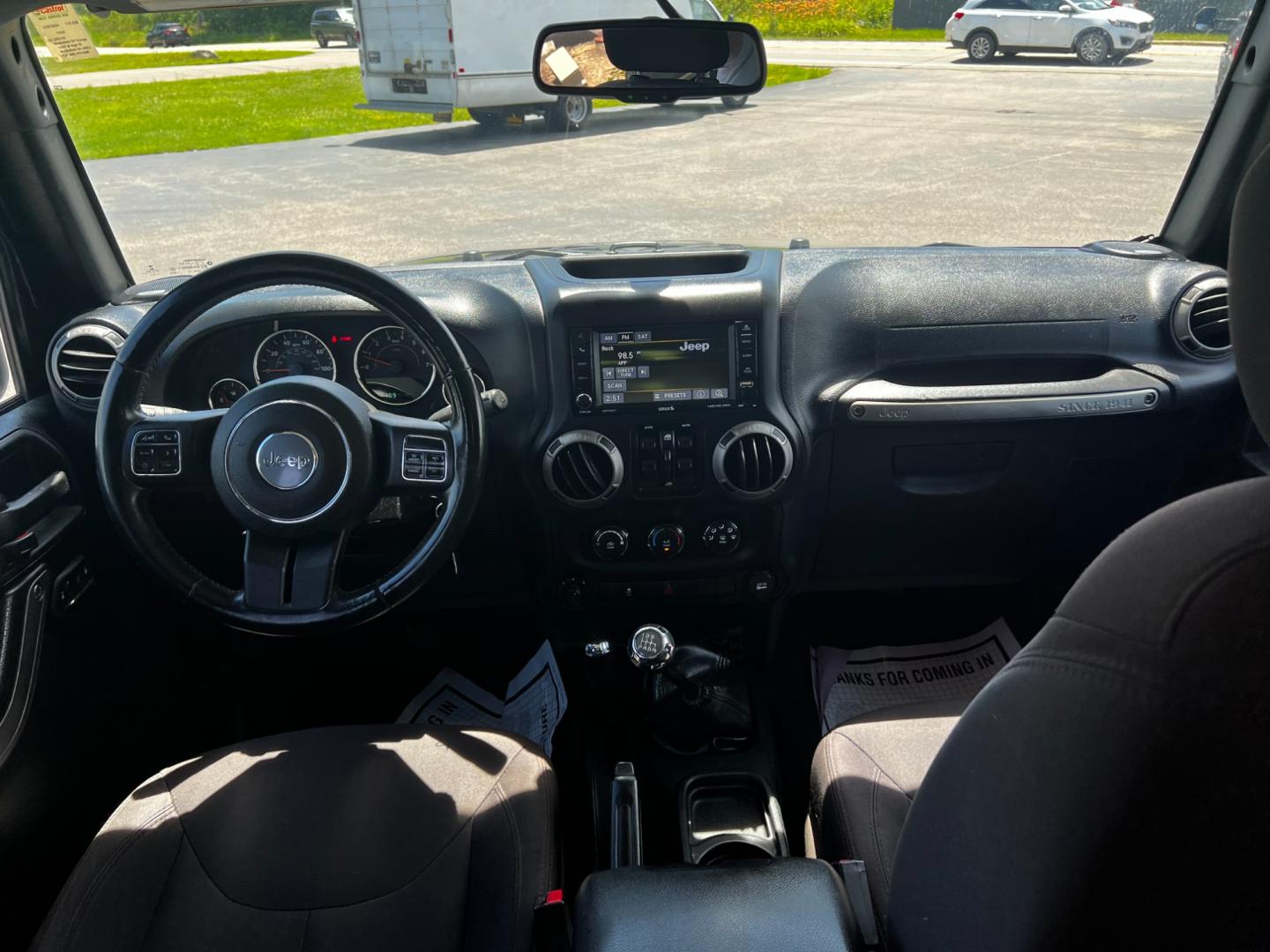 2015 Black /Black Jeep Wrangler Unlimited Willys 4WD (1C4BJWDG9FL) with an 3.6L V6 DOHC 24V engine, 6 Speed Manual transmission, located at 11115 Chardon Rd. , Chardon, OH, 44024, (440) 214-9705, 41.580246, -81.241943 - This 2015 Jeep Wrangler Unlimited Willy Wheeler Edition is a capable and well-equipped off-road vehicle. It features a 3.6-liter Pentastar V6 engine paired with a 6-speed manual transmission, offering a traditional driving experience favored by many off-road enthusiasts. The vehicle comes with sever - Photo#29