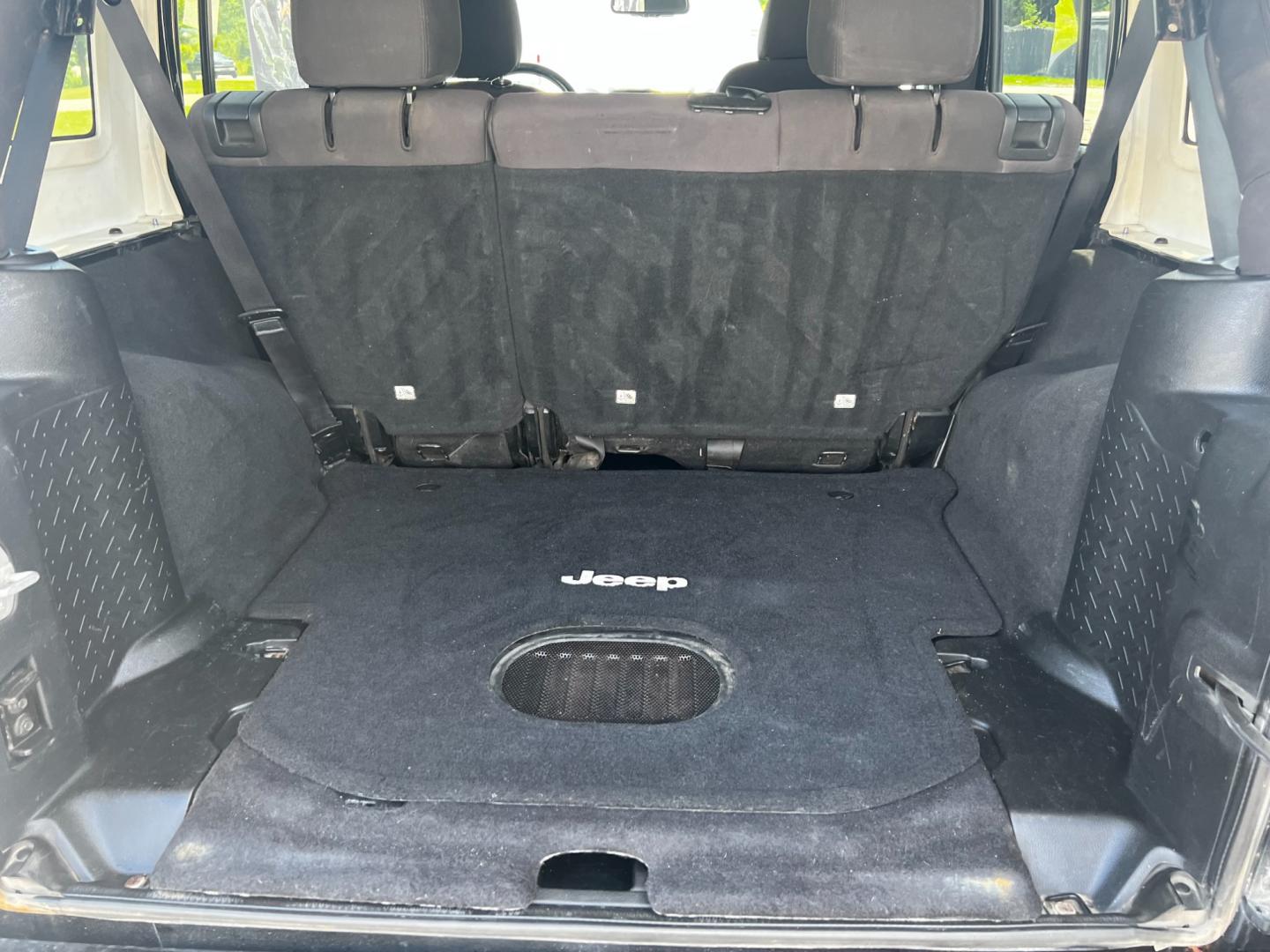 2015 Black /Black Jeep Wrangler Unlimited Willys 4WD (1C4BJWDG9FL) with an 3.6L V6 DOHC 24V engine, 6 Speed Manual transmission, located at 11115 Chardon Rd. , Chardon, OH, 44024, (440) 214-9705, 41.580246, -81.241943 - This 2015 Jeep Wrangler Unlimited Willy Wheeler Edition is a capable and well-equipped off-road vehicle. It features a 3.6-liter Pentastar V6 engine paired with a 6-speed manual transmission, offering a traditional driving experience favored by many off-road enthusiasts. The vehicle comes with sever - Photo#30