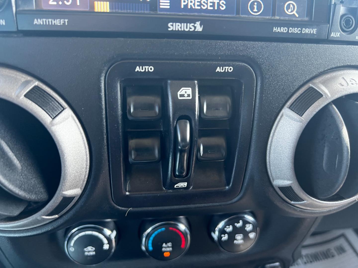 2015 Black /Black Jeep Wrangler Unlimited Willys 4WD (1C4BJWDG9FL) with an 3.6L V6 DOHC 24V engine, 6 Speed Manual transmission, located at 11115 Chardon Rd. , Chardon, OH, 44024, (440) 214-9705, 41.580246, -81.241943 - This 2015 Jeep Wrangler Unlimited Willy Wheeler Edition is a capable and well-equipped off-road vehicle. It features a 3.6-liter Pentastar V6 engine paired with a 6-speed manual transmission, offering a traditional driving experience favored by many off-road enthusiasts. The vehicle comes with sever - Photo#23