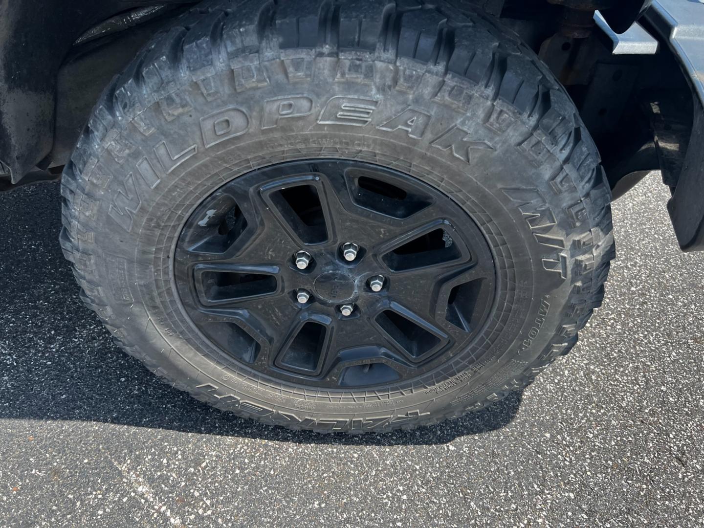 2015 Black /Black Jeep Wrangler Unlimited Willys 4WD (1C4BJWDG9FL) with an 3.6L V6 DOHC 24V engine, 6 Speed Manual transmission, located at 11115 Chardon Rd. , Chardon, OH, 44024, (440) 214-9705, 41.580246, -81.241943 - This 2015 Jeep Wrangler Unlimited Willy Wheeler Edition is a capable and well-equipped off-road vehicle. It features a 3.6-liter Pentastar V6 engine paired with a 6-speed manual transmission, offering a traditional driving experience favored by many off-road enthusiasts. The vehicle comes with sever - Photo#10