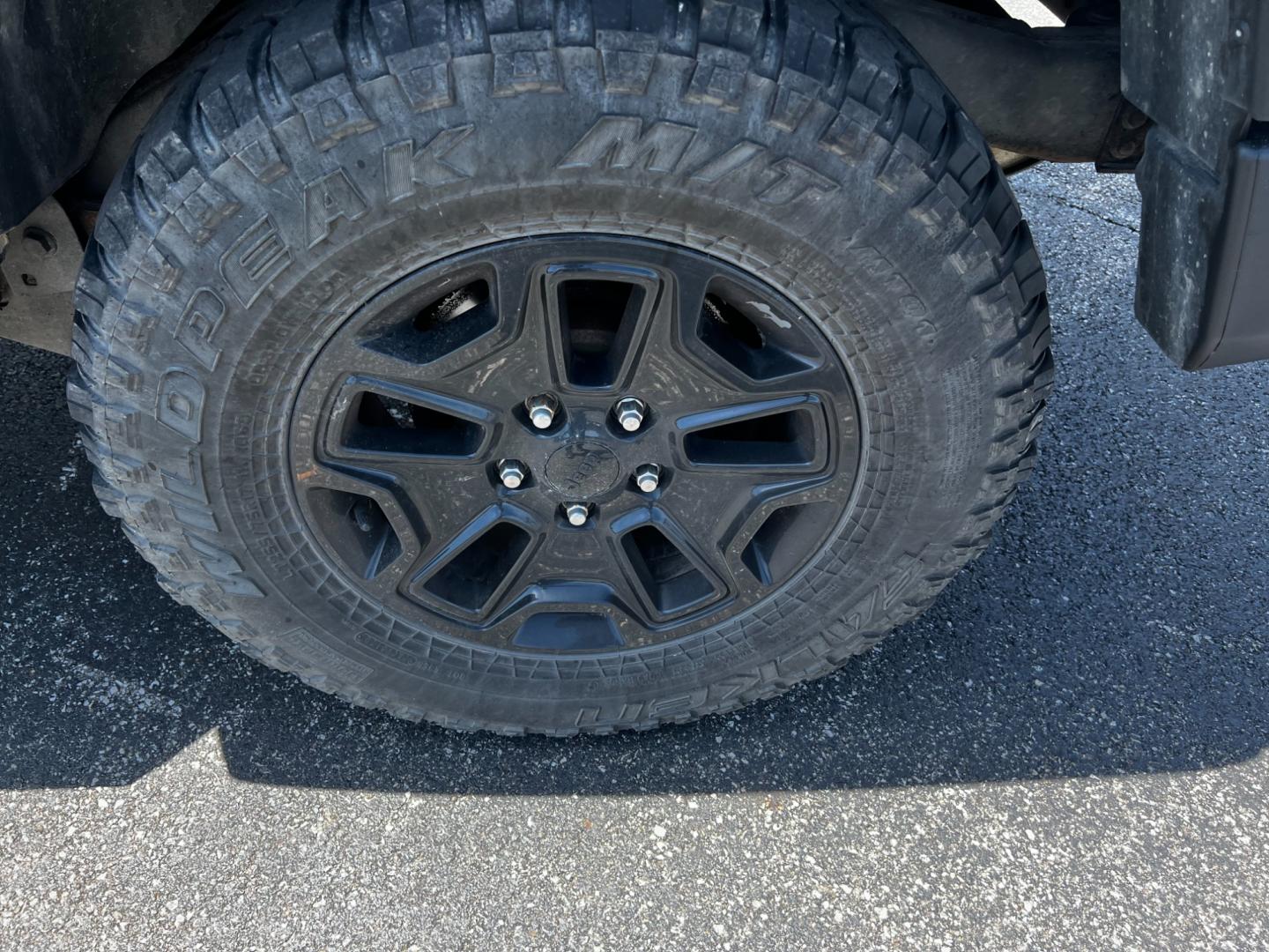 2015 Black /Black Jeep Wrangler Unlimited Willys 4WD (1C4BJWDG9FL) with an 3.6L V6 DOHC 24V engine, 6 Speed Manual transmission, located at 11115 Chardon Rd. , Chardon, OH, 44024, (440) 214-9705, 41.580246, -81.241943 - This 2015 Jeep Wrangler Unlimited Willy Wheeler Edition is a capable and well-equipped off-road vehicle. It features a 3.6-liter Pentastar V6 engine paired with a 6-speed manual transmission, offering a traditional driving experience favored by many off-road enthusiasts. The vehicle comes with sever - Photo#12